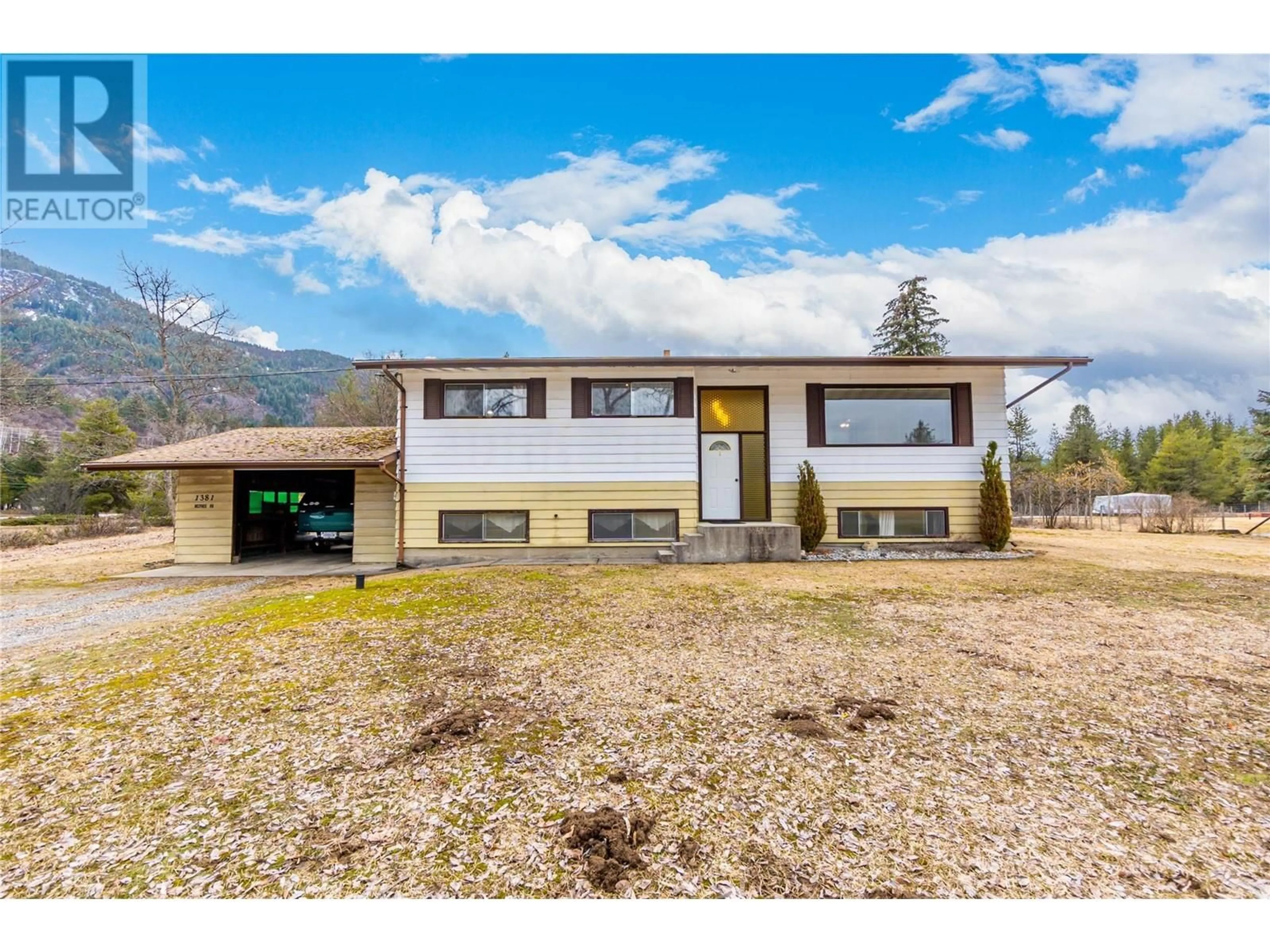 A pic from outside/outdoor area/front of a property/back of a property/a pic from drone, mountain view for 1381 MCPHEE ROAD, Castlegar British Columbia V1N4M1