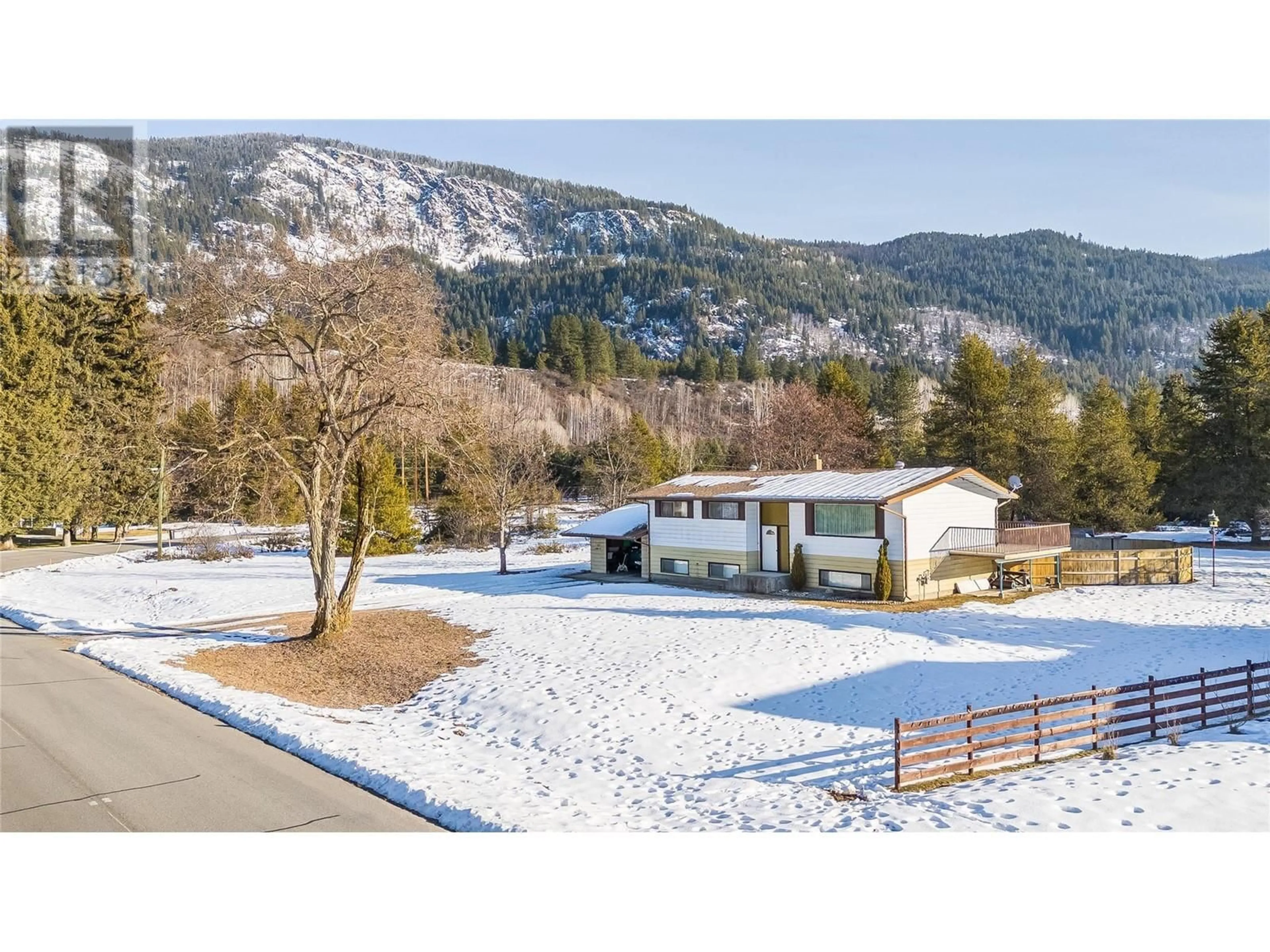 A pic from outside/outdoor area/front of a property/back of a property/a pic from drone, mountain view for 1381 MCPHEE ROAD, Castlegar British Columbia V1N4M1