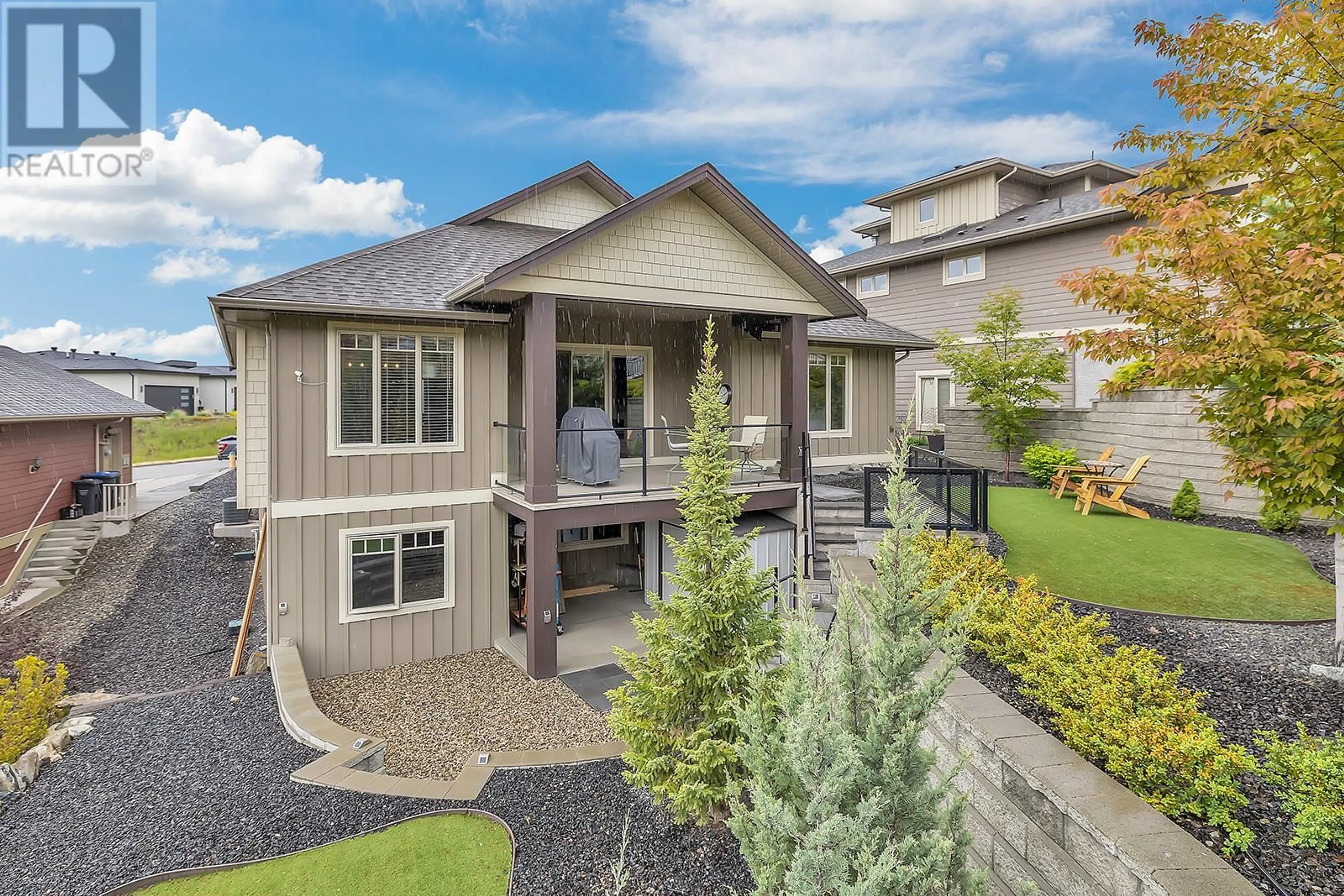 Home with vinyl exterior material, street for 1737 TOWER RANCH BOULEVARD, Kelowna British Columbia V1P1P9