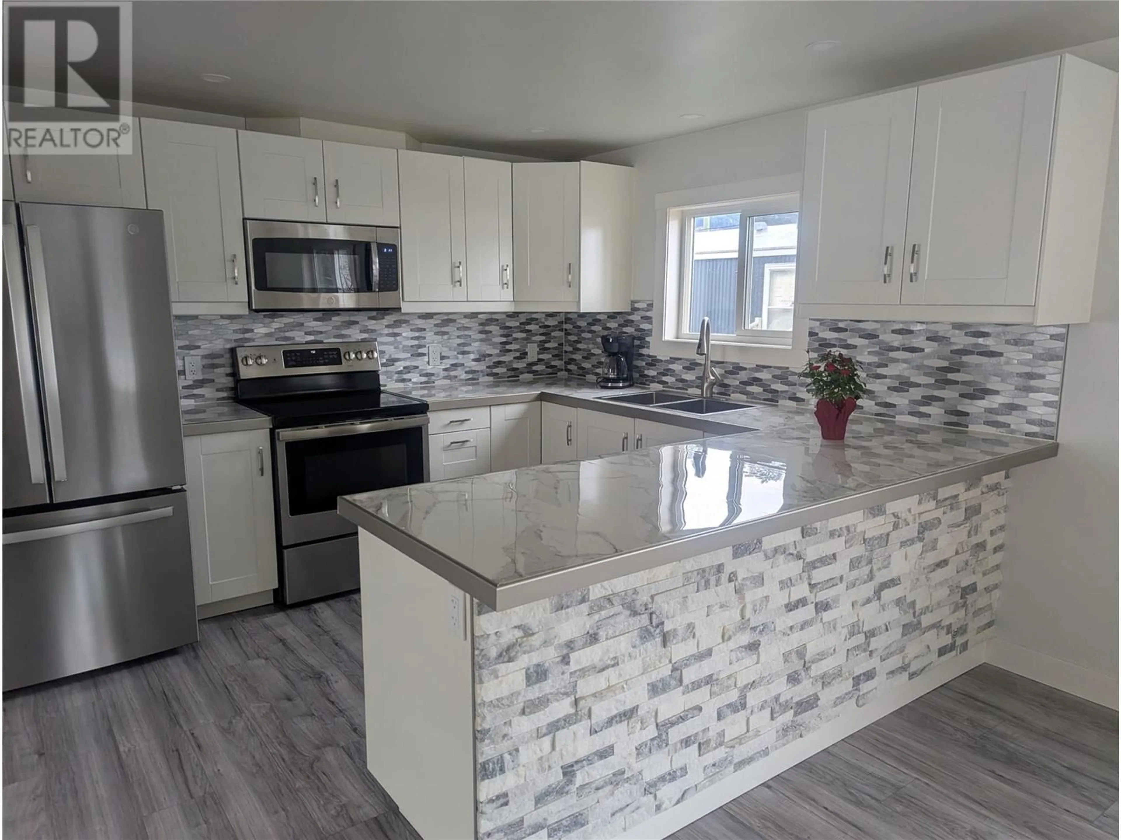 Open concept kitchen, ceramic/tile floor for 1214 Okanagan Avenue Unit# 32, Chase British Columbia V0E1M0