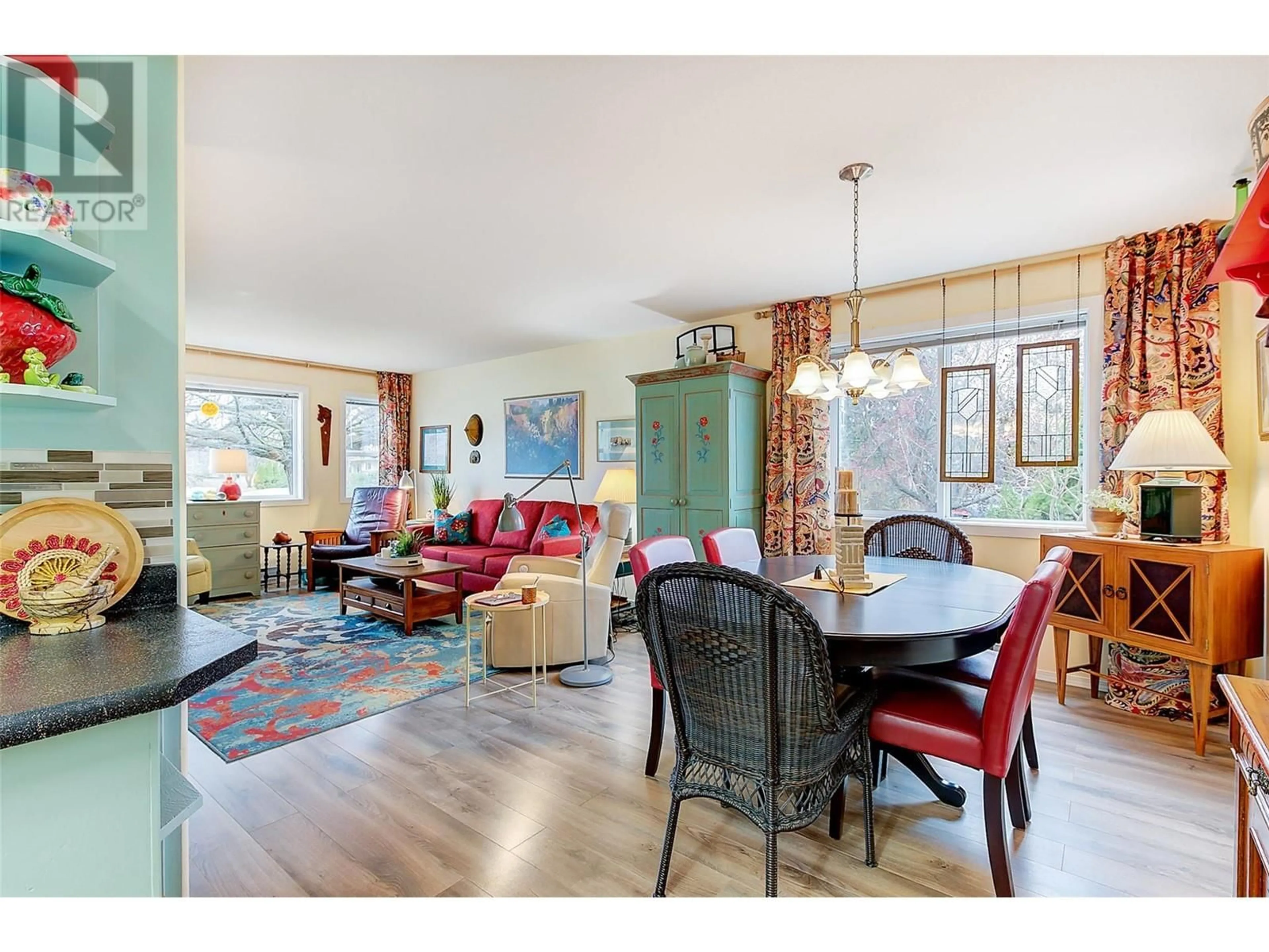 Dining room, wood/laminate floor for 2209 STILLINGFLEET COURT, Kelowna British Columbia V1Y9N3