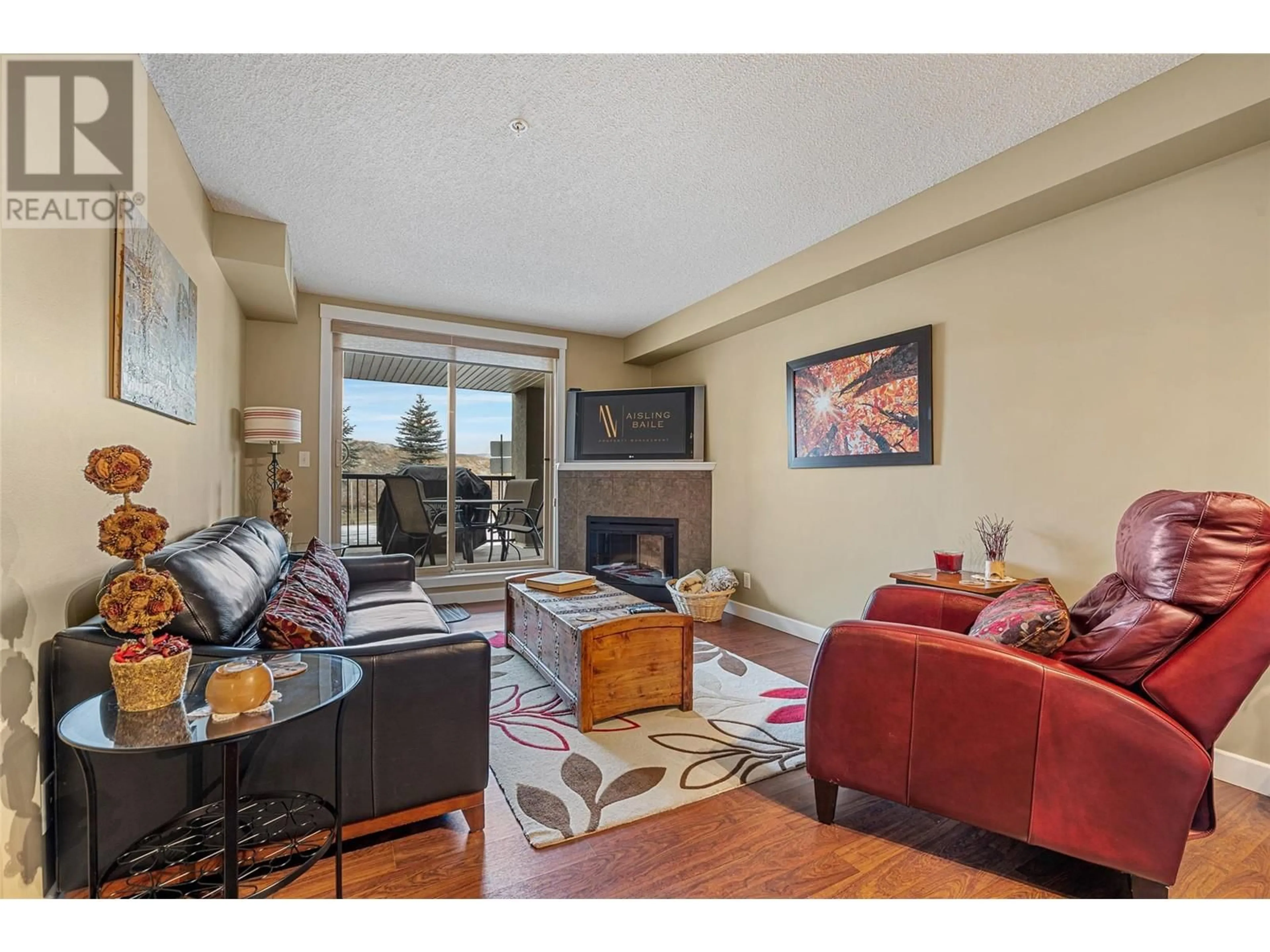 Living room with furniture, wood/laminate floor for 1113 - 205 THIRD AVENUE, Invermere British Columbia V0A1K7