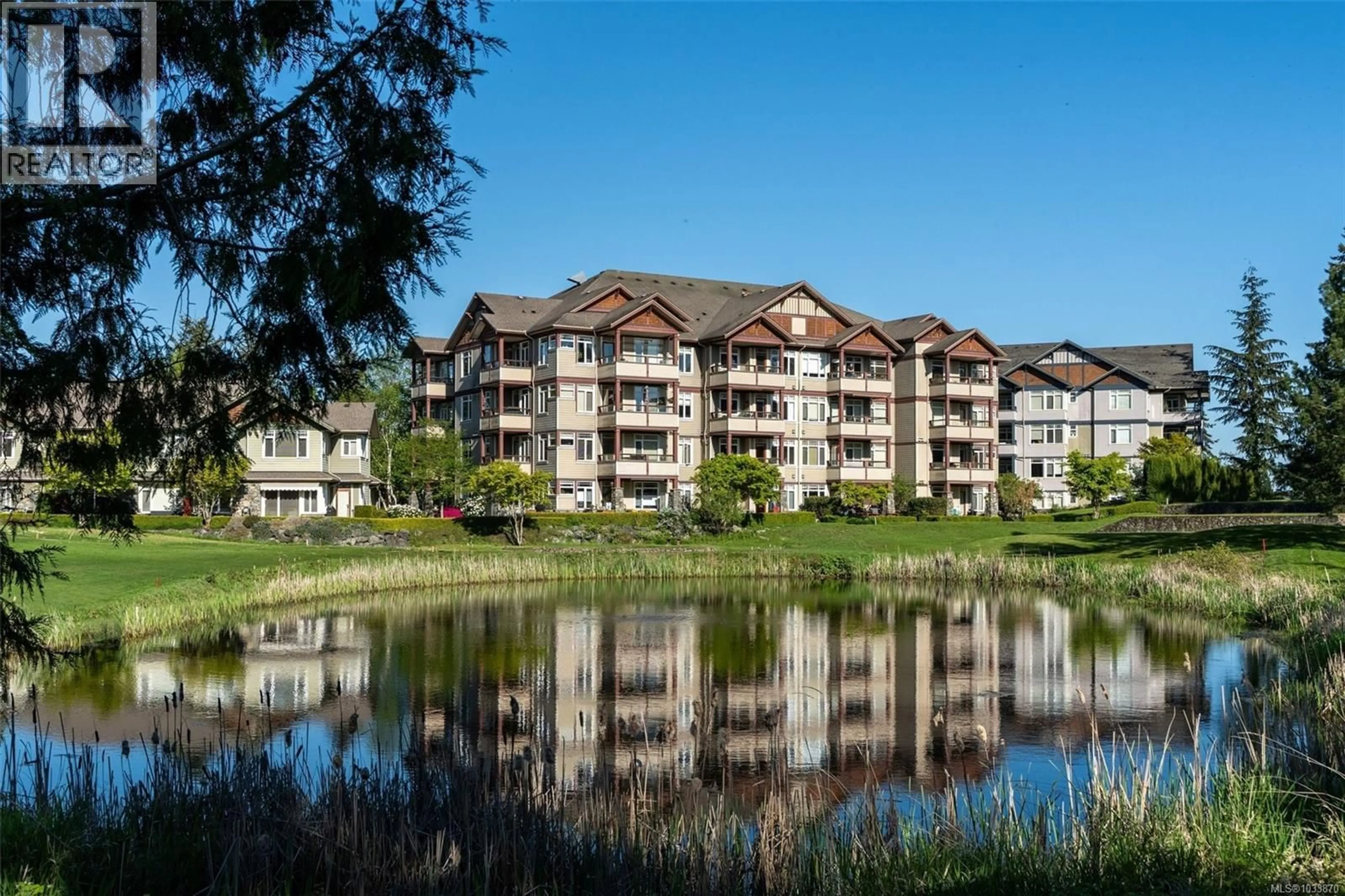 A pic from outside/outdoor area/front of a property/back of a property/a pic from drone, water/lake/river/ocean view for 102E - 1115 CRAIGFLOWER ROAD, Esquimalt British Columbia V9A7R1