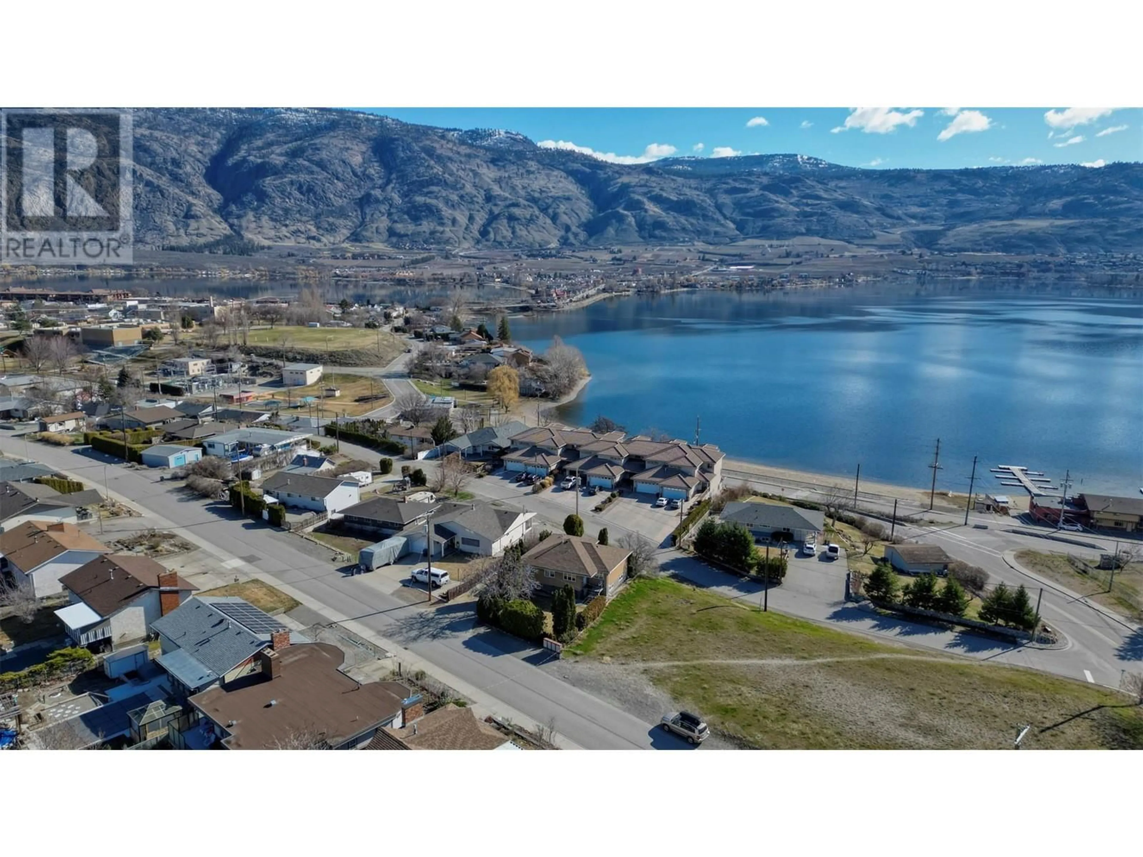 A pic from outside/outdoor area/front of a property/back of a property/a pic from drone, water/lake/river/ocean view for 14 Osprey Place, Osoyoos British Columbia V0H1V1