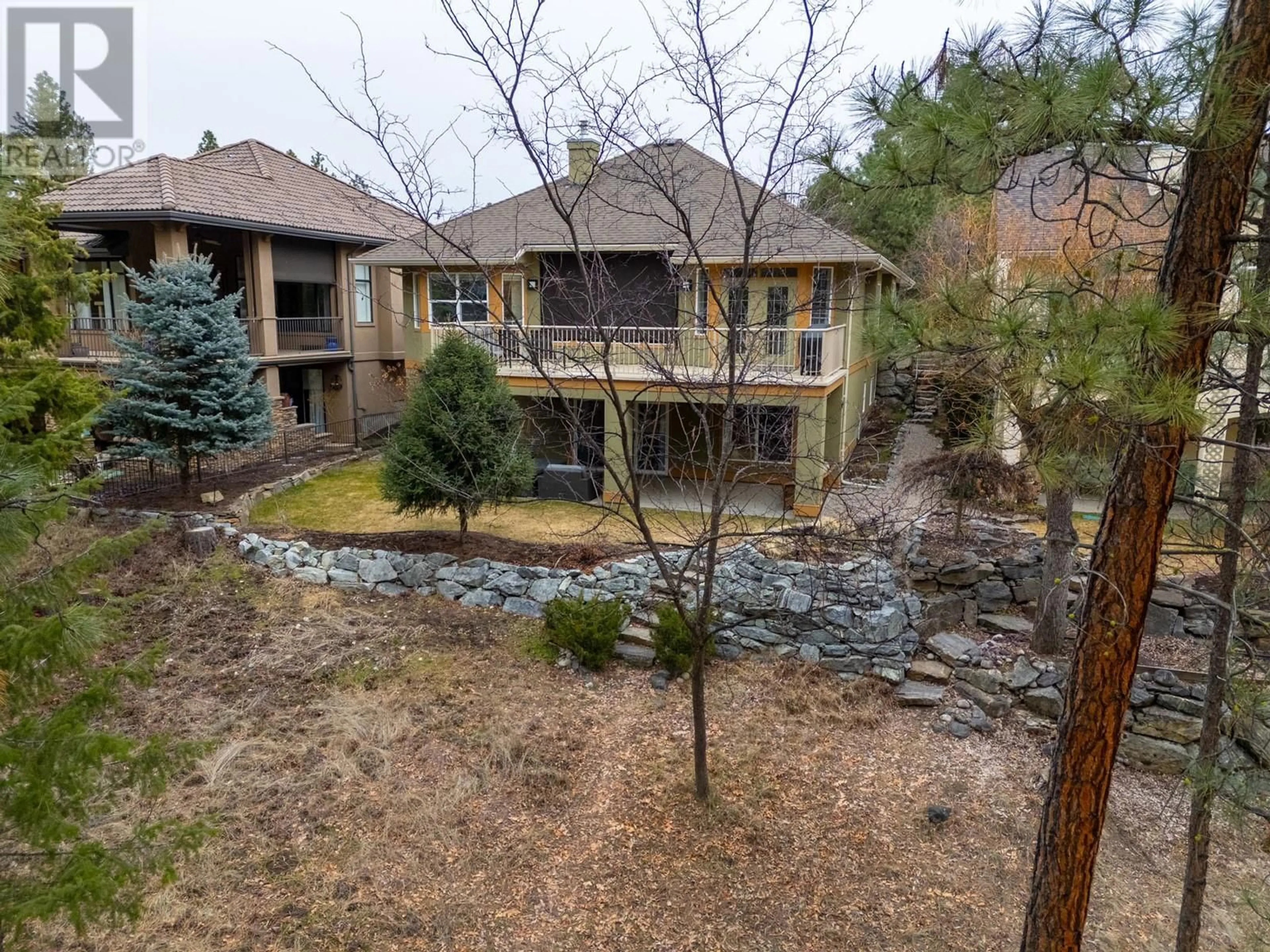 A pic from outside/outdoor area/front of a property/back of a property/a pic from drone, water/lake/river/ocean view for 4158 GALLAGHERS FOREST SOUTH, Kelowna British Columbia V1W5E4