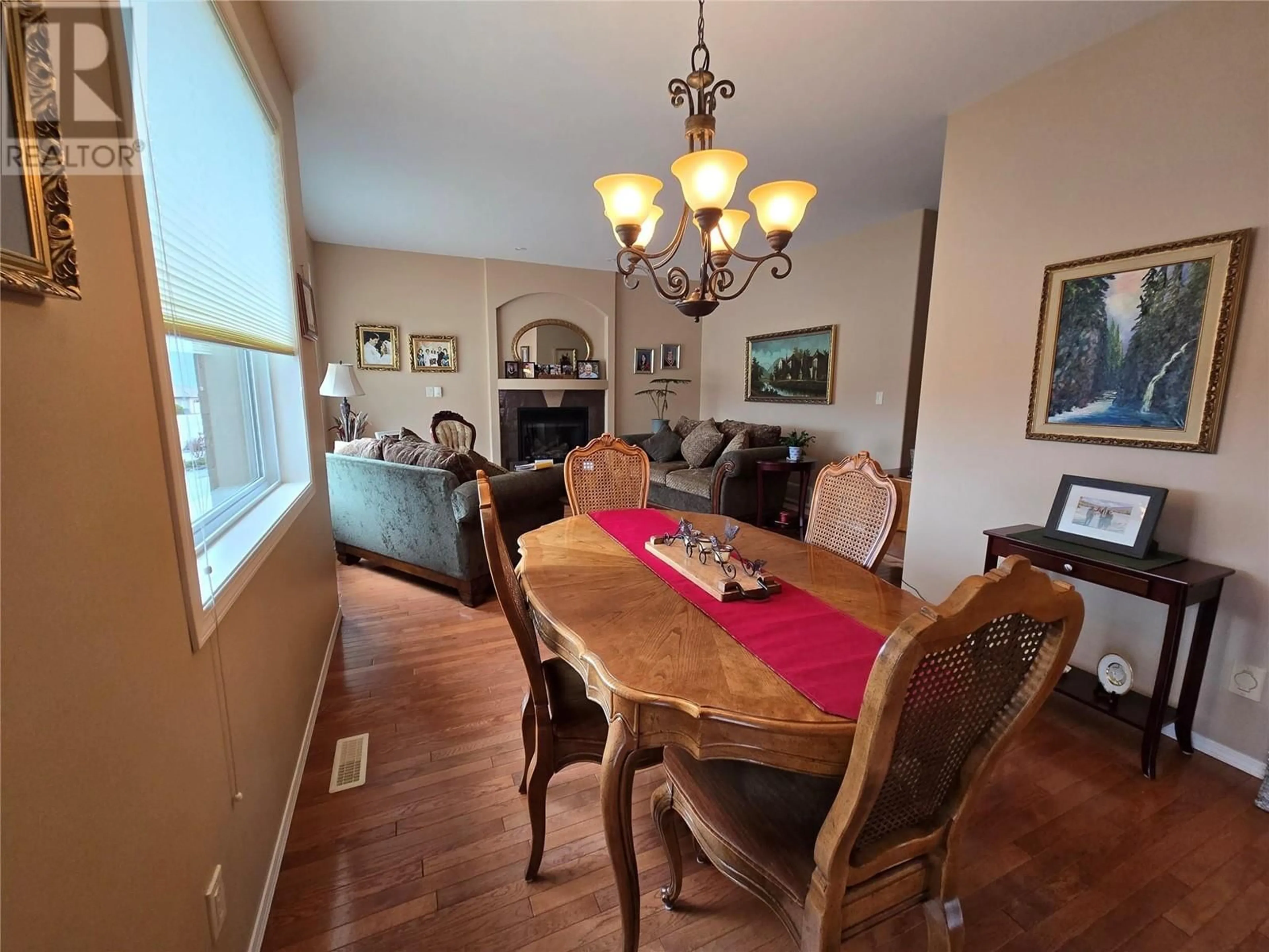 Dining room, wood/laminate floor for 11908 LA COSTA LANE, Osoyoos British Columbia V0H1V4