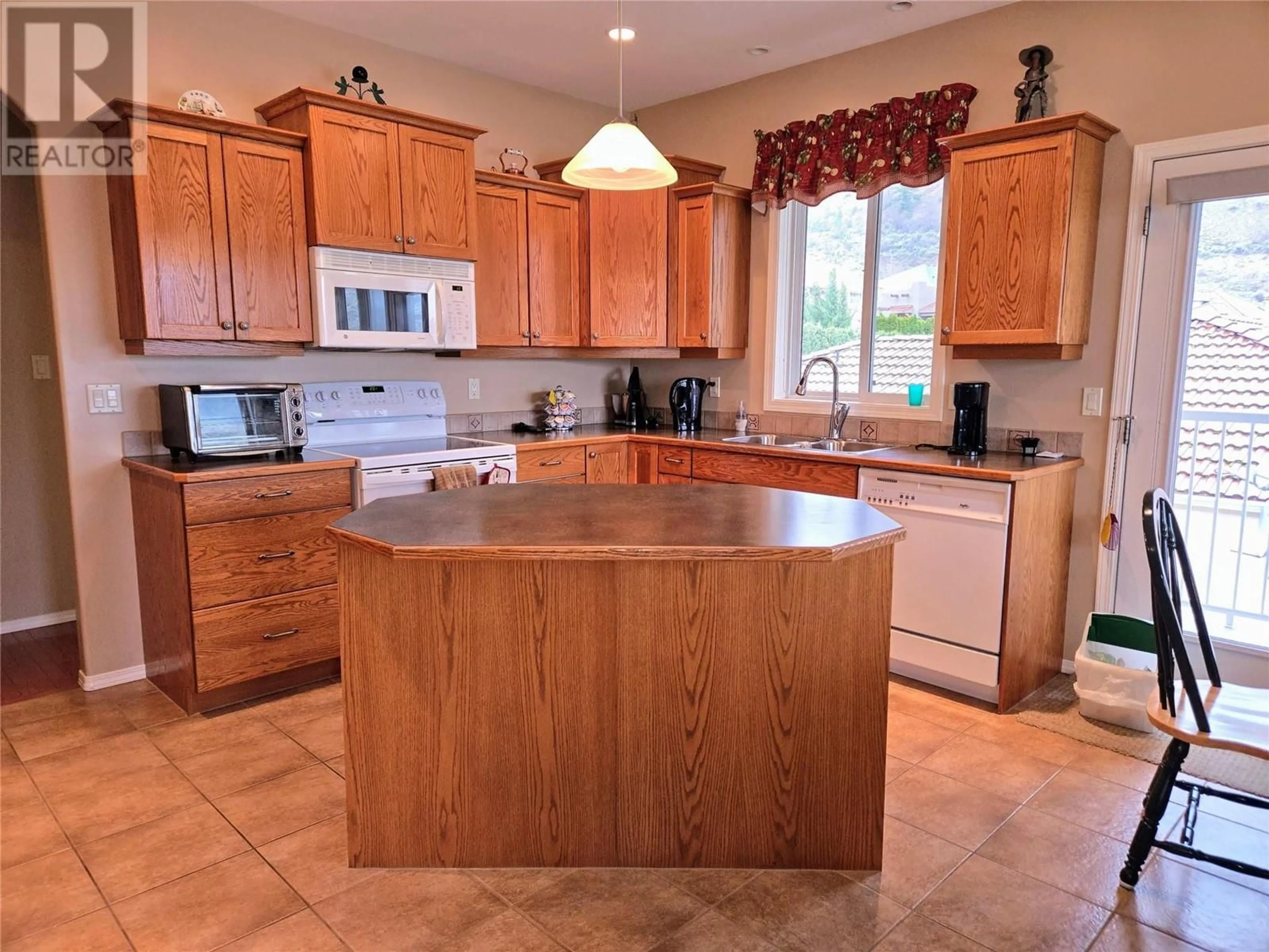 Open concept kitchen, ceramic/tile floor for 11908 LA COSTA LANE, Osoyoos British Columbia V0H1V4