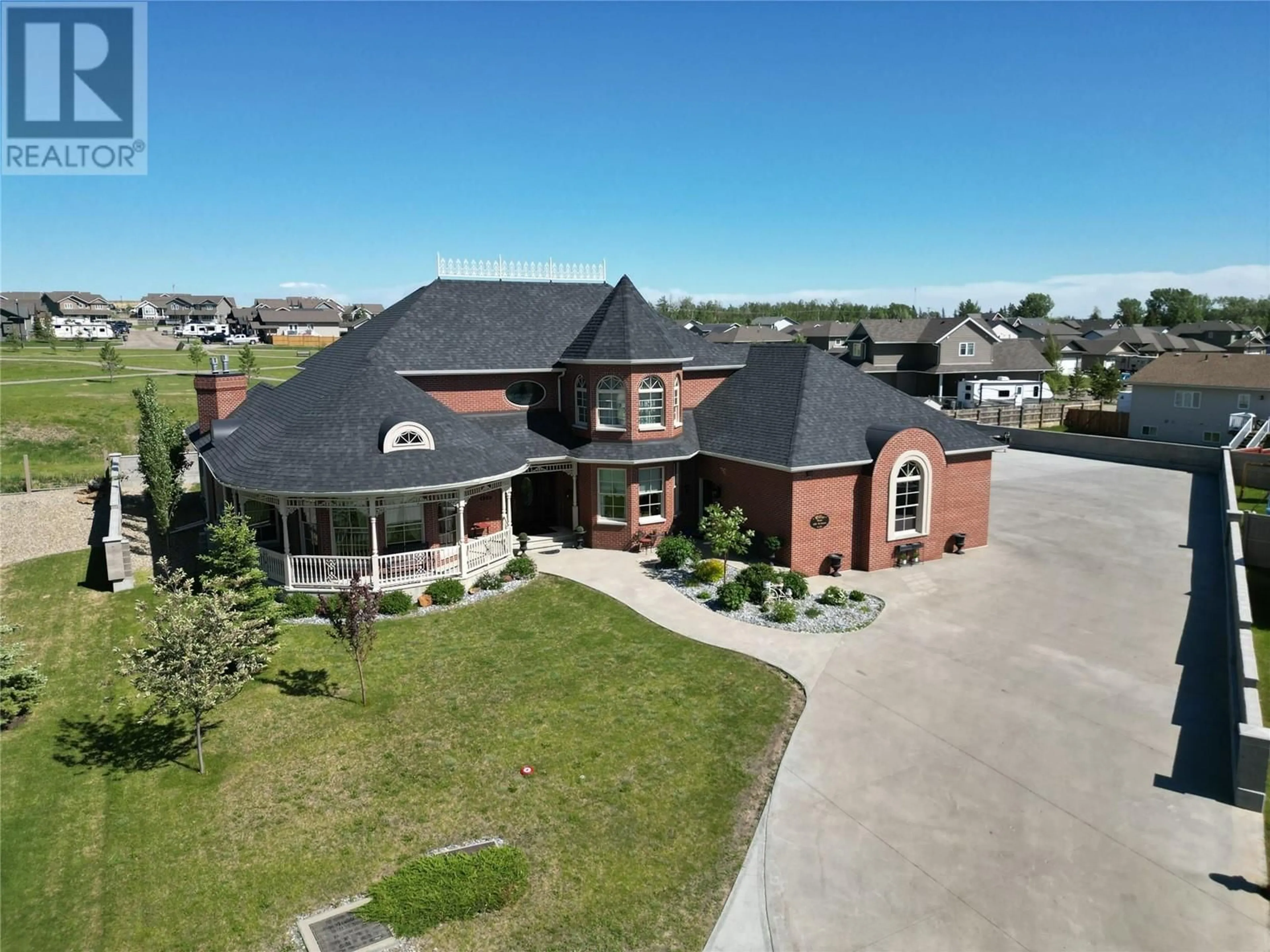 A pic from outside/outdoor area/front of a property/back of a property/a pic from drone, unknown for 1829 86 Avenue, Dawson Creek British Columbia V1G0C8