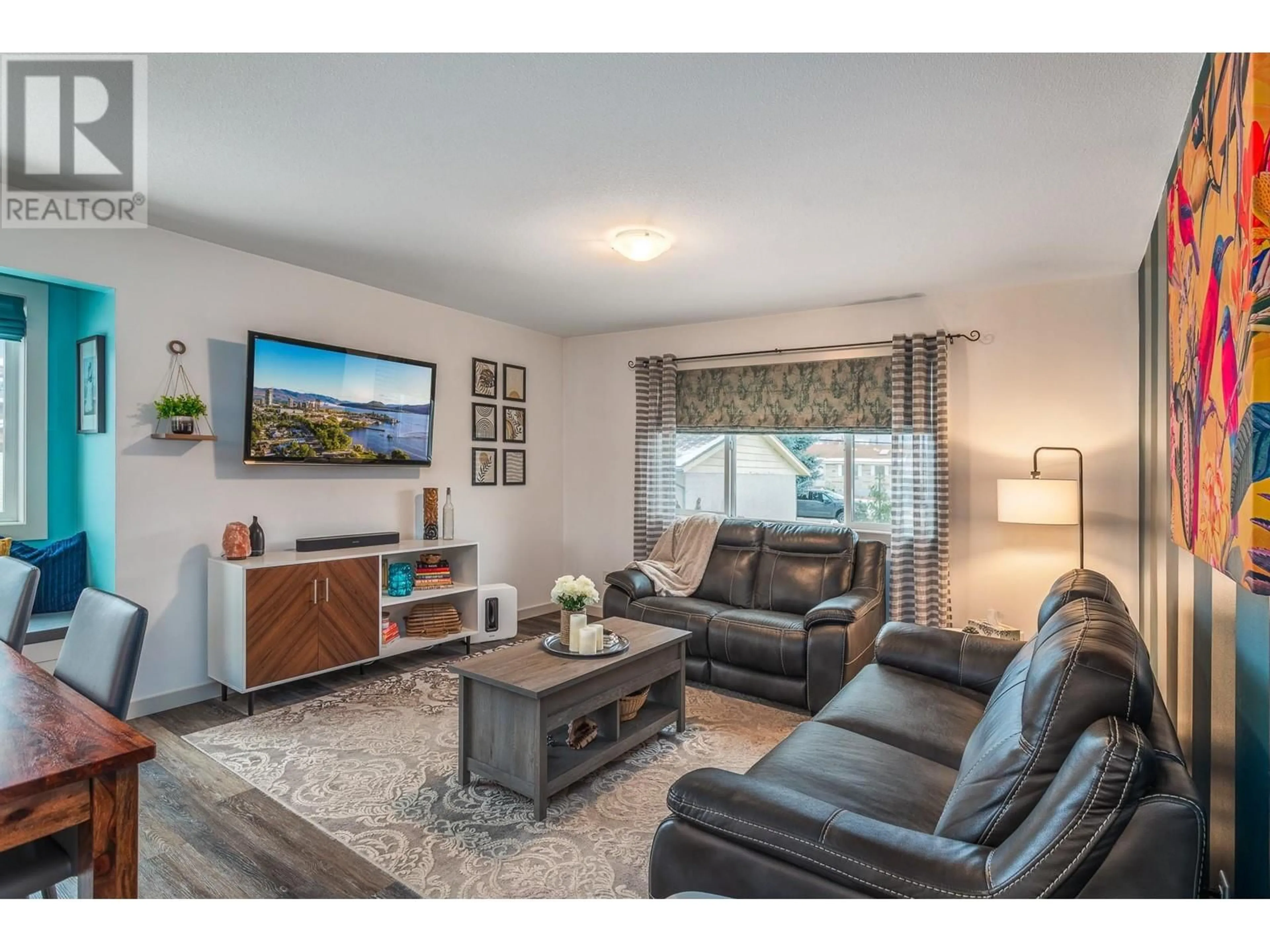 Living room with furniture, wood/laminate floor for 384 HARDIE ROAD, Kelowna British Columbia V1X2H2