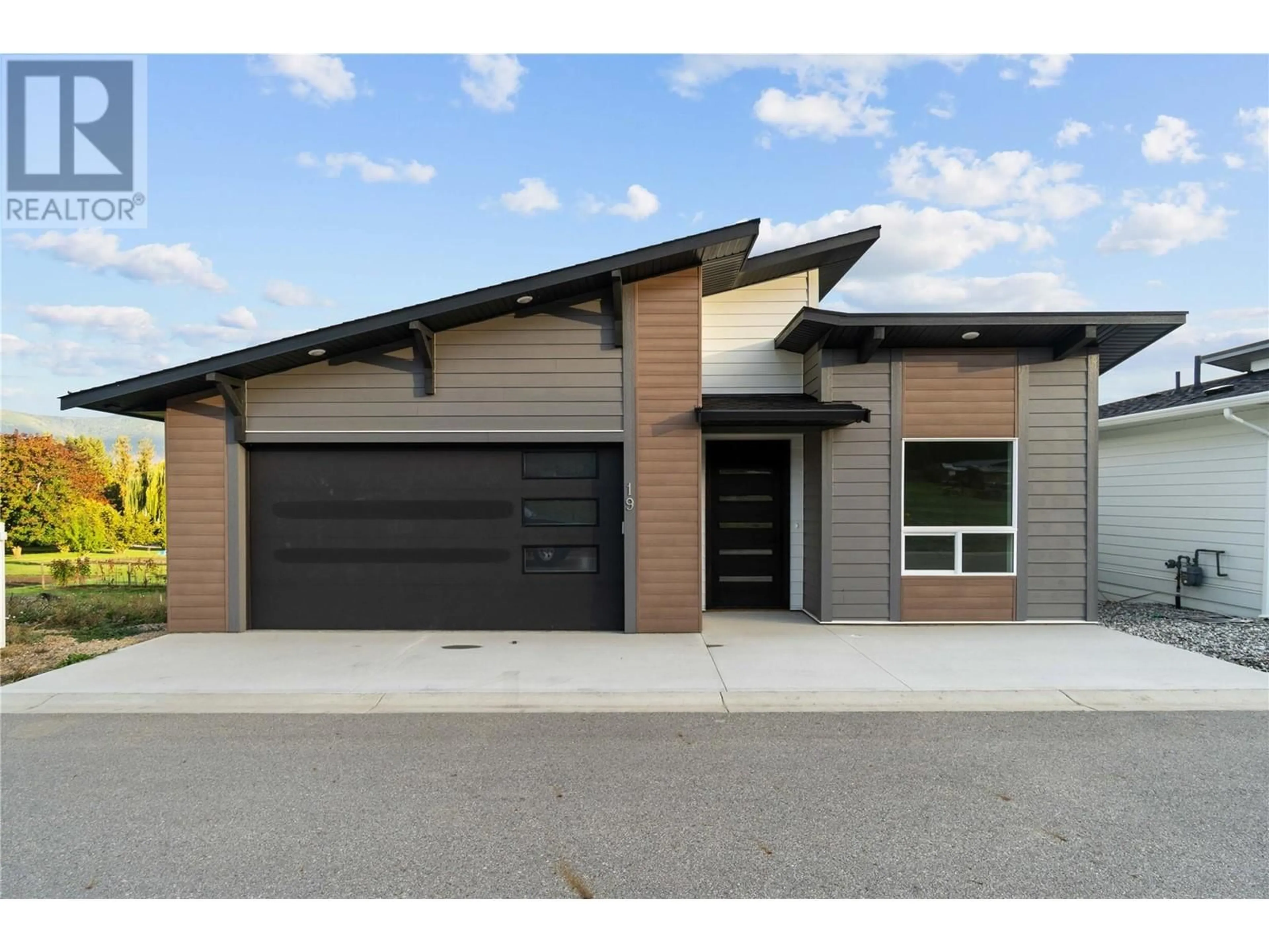 Home with brick exterior material, street for 1840 10 Street SW Unit# 19 Lot# 24, Salmon Arm British Columbia V1E0H2