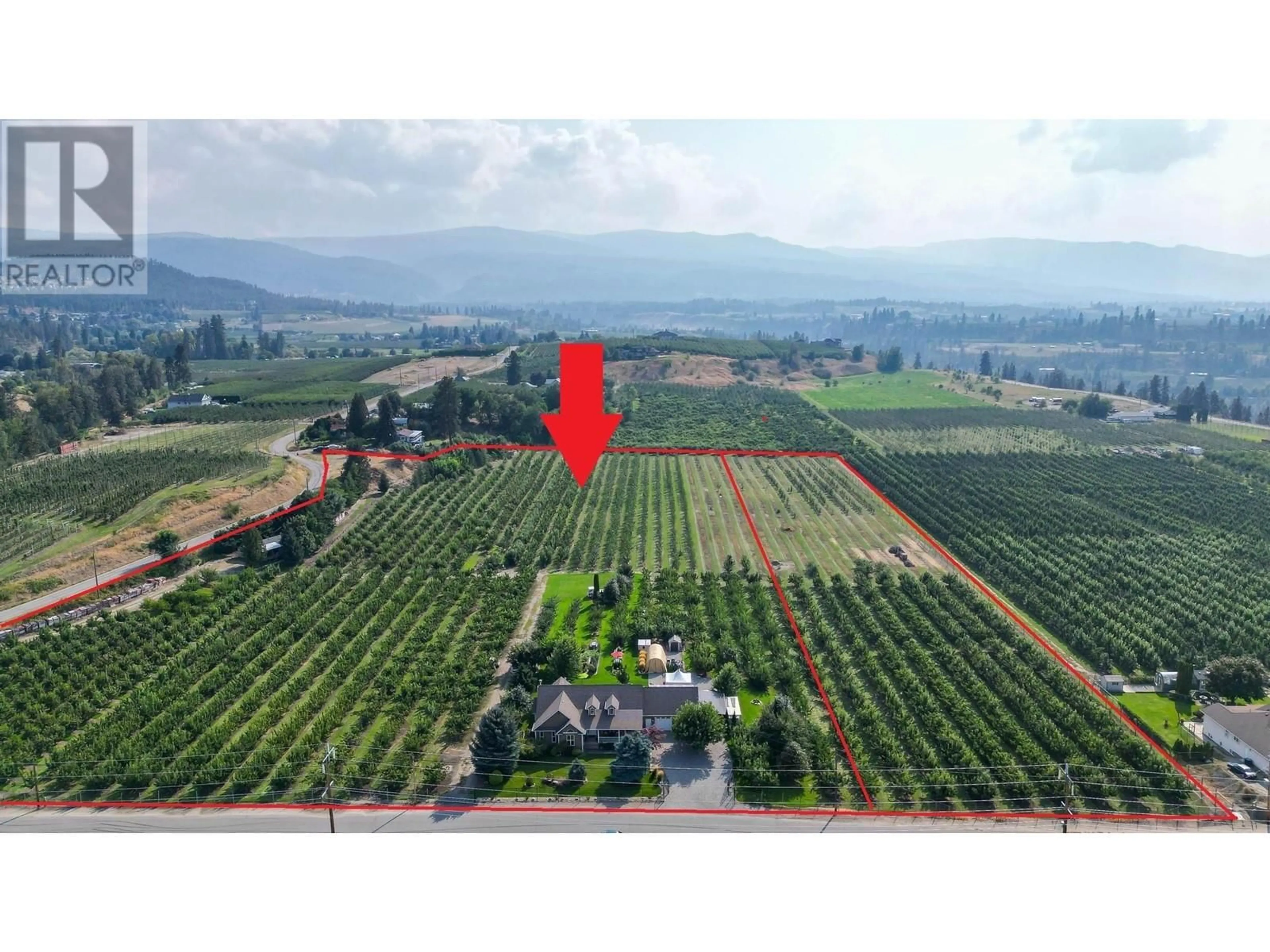 A pic from outside/outdoor area/front of a property/back of a property/a pic from drone, mountain view for 1409 TEASDALE ROAD, Kelowna British Columbia V1P1C8