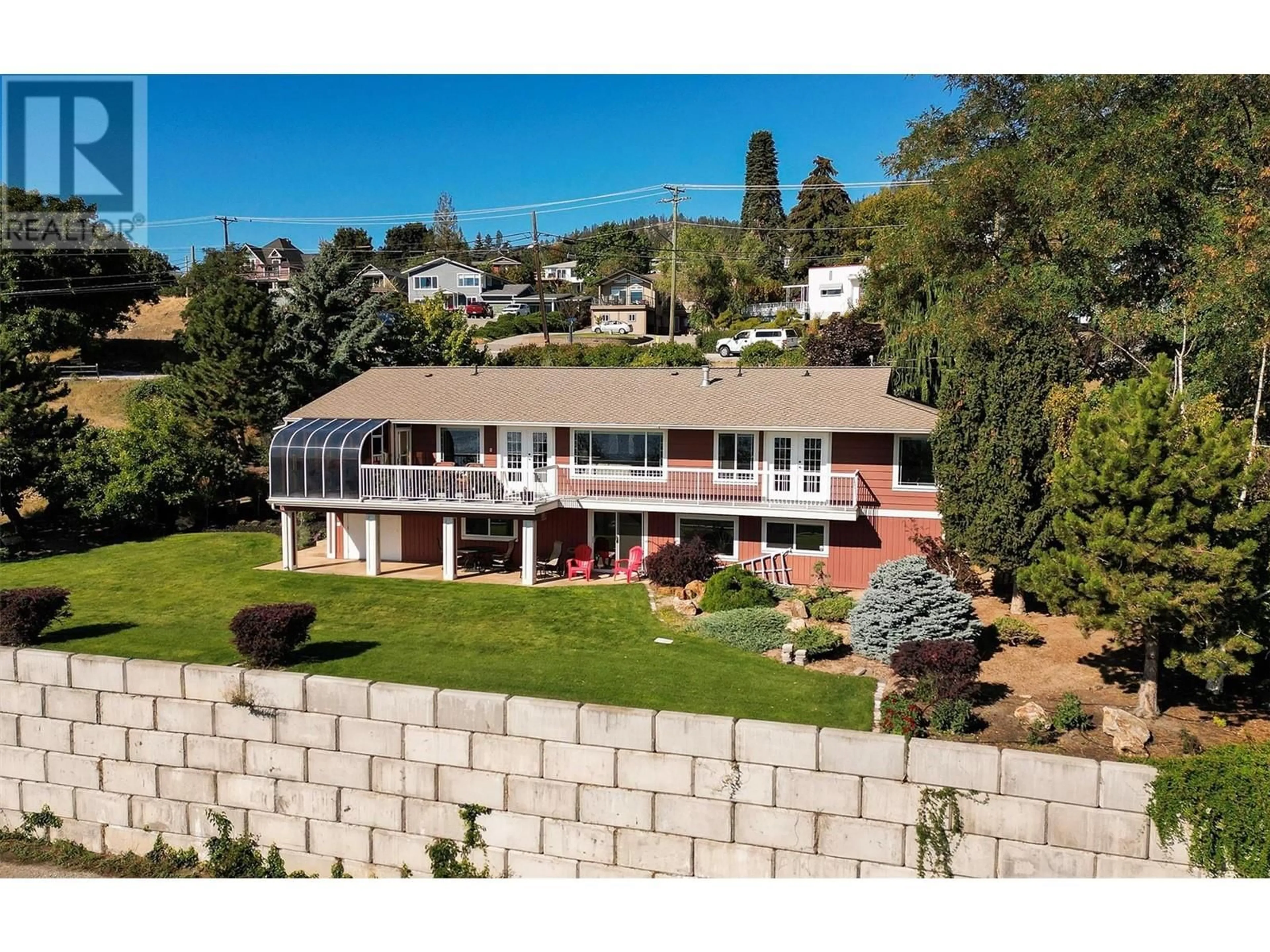 A pic from outside/outdoor area/front of a property/back of a property/a pic from drone, mountain view for 4649 PRINCETON AVENUE, Peachland British Columbia V0H1X7