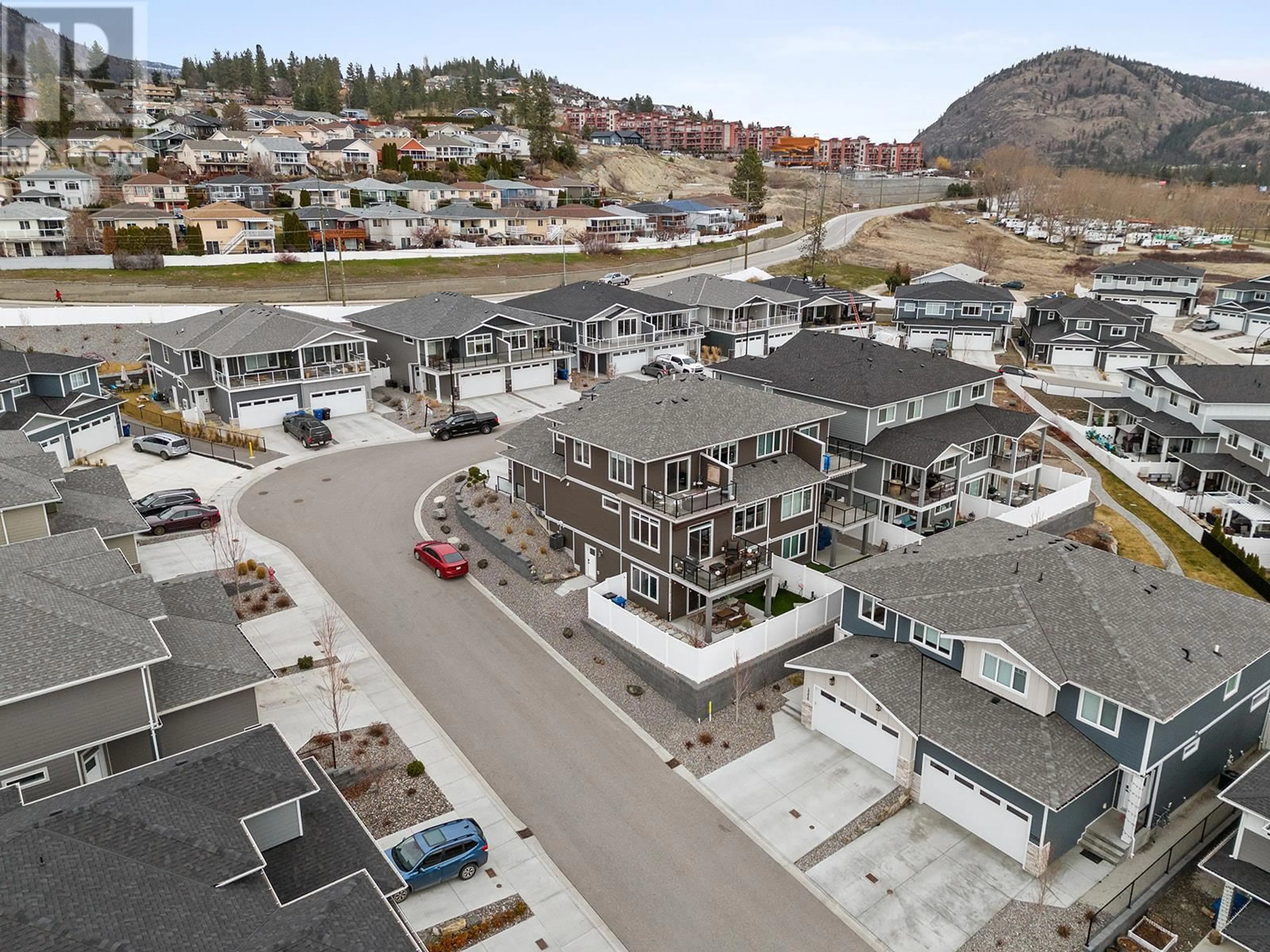 A pic from outside/outdoor area/front of a property/back of a property/a pic from drone, mountain view for 3354 Hawks Crescent, West Kelowna British Columbia V4T0A7