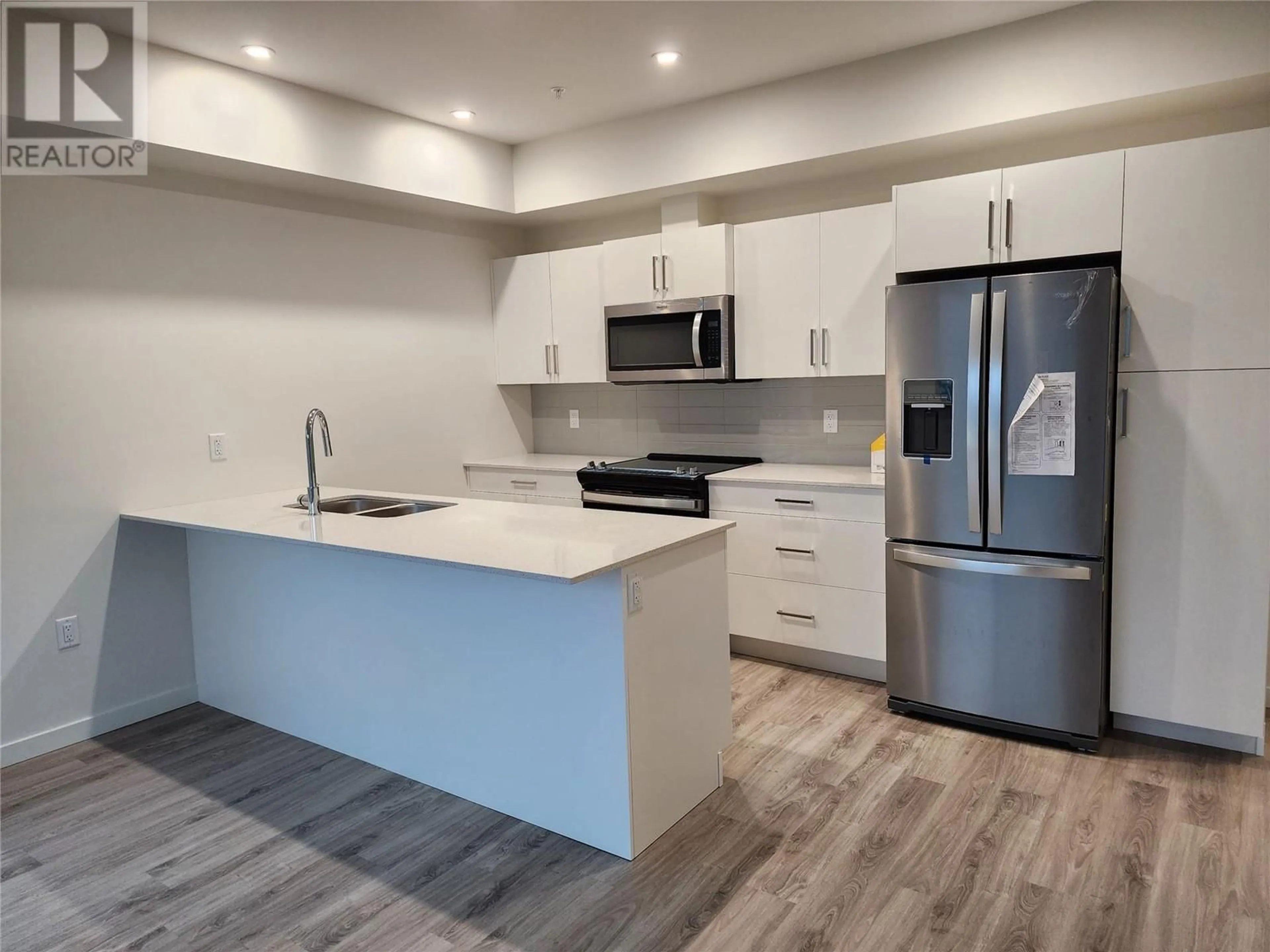 Open concept kitchen, unknown for 304 - 2345 BUTT ROAD, West Kelowna British Columbia V4T1N6