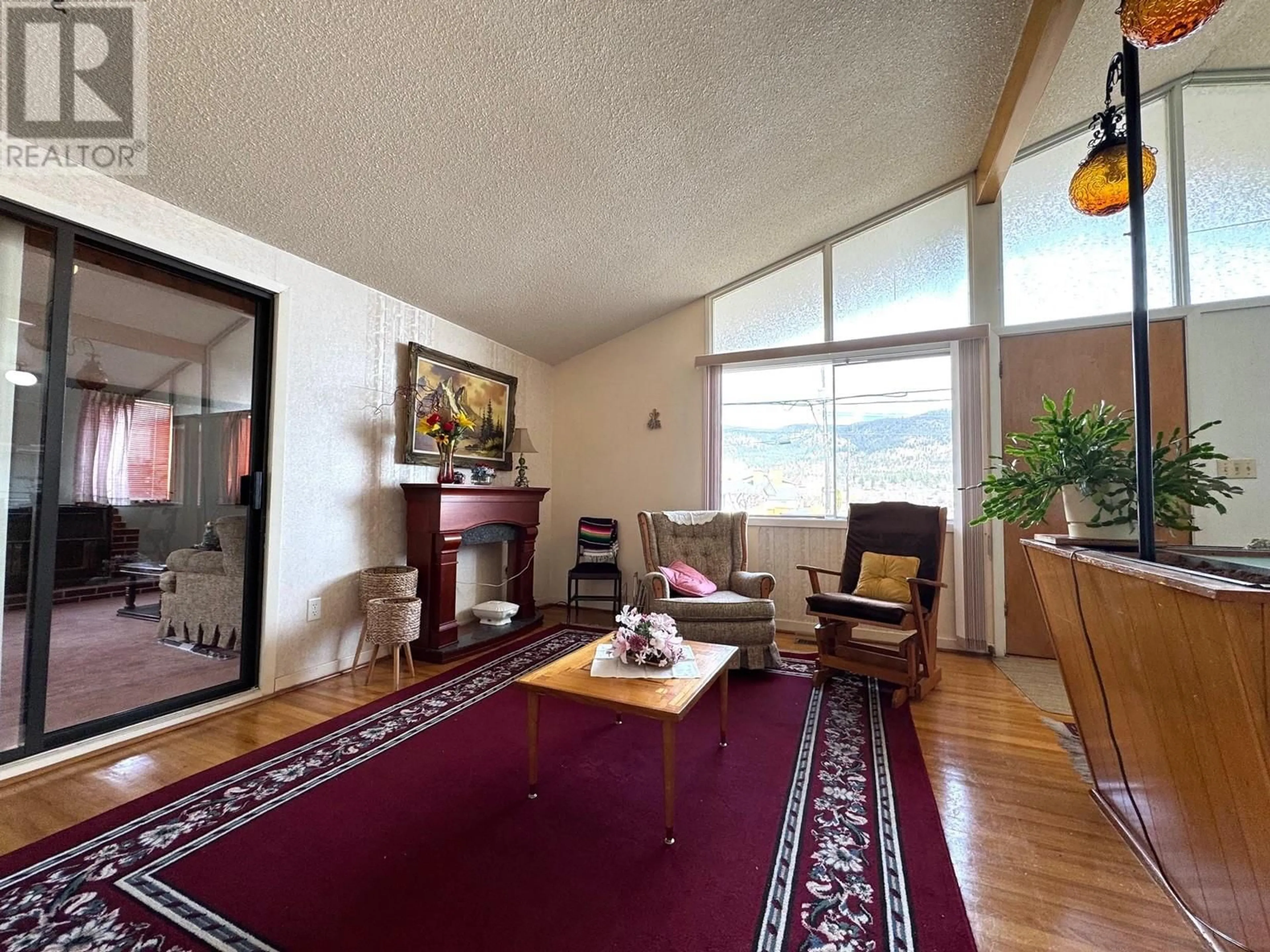 Living room with furniture, unknown for 2264 MERRITT AVENUE, Merritt British Columbia V1K1B8