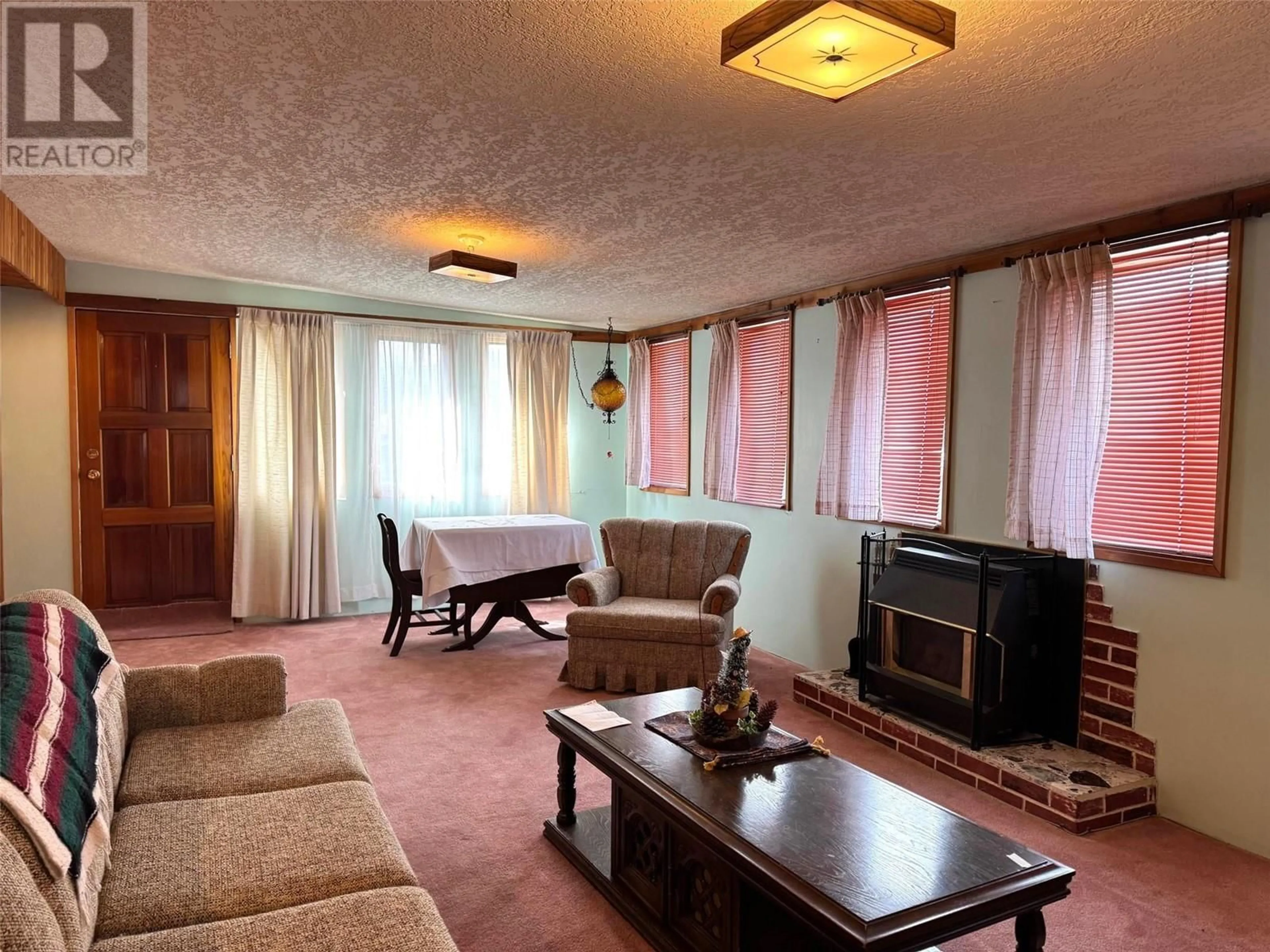 Living room with furniture, unknown for 2264 MERRITT AVENUE, Merritt British Columbia V1K1B8