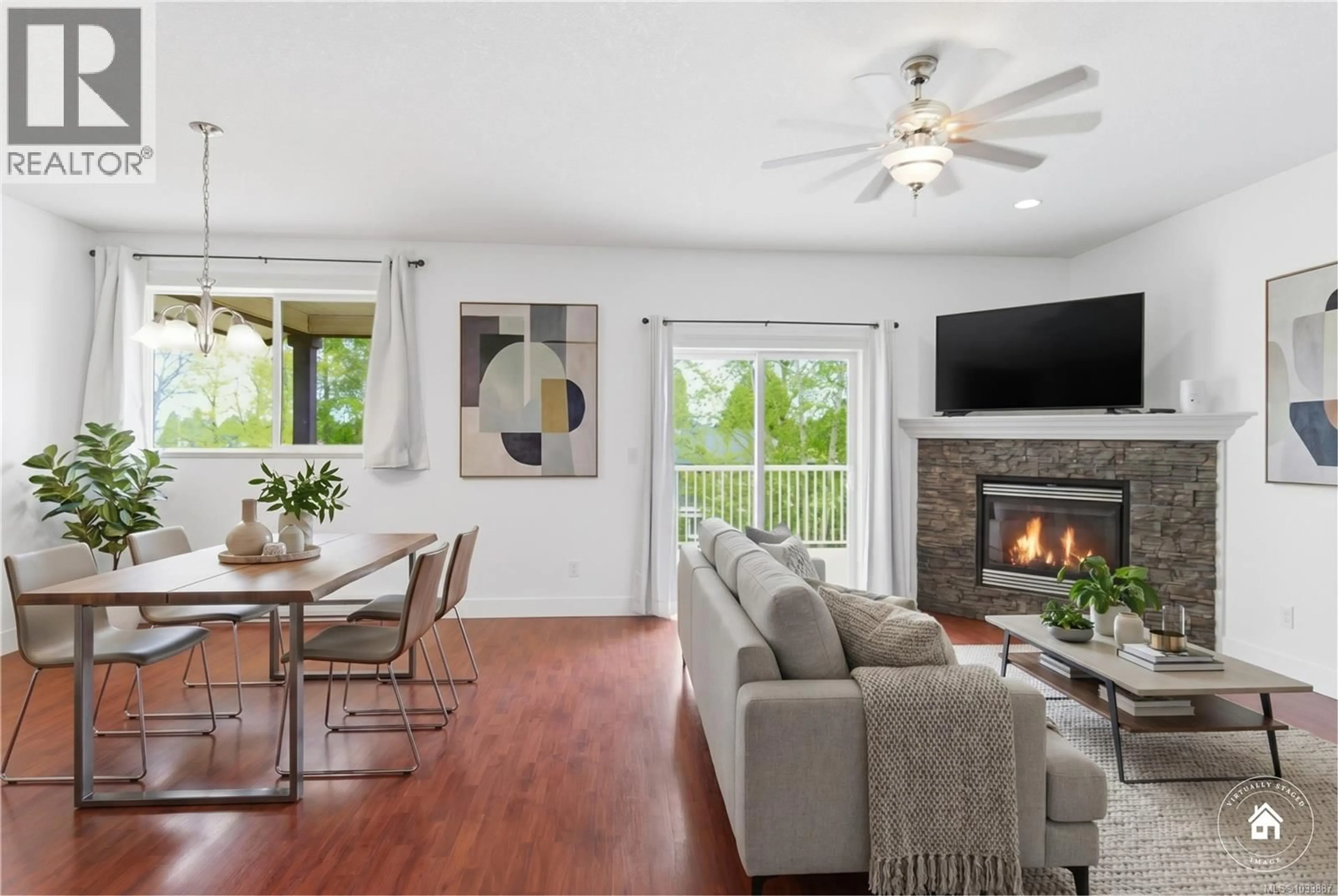 Living room with furniture, wood/laminate floor for 686 HOWARD AVENUE, Nanaimo British Columbia V9R3S7
