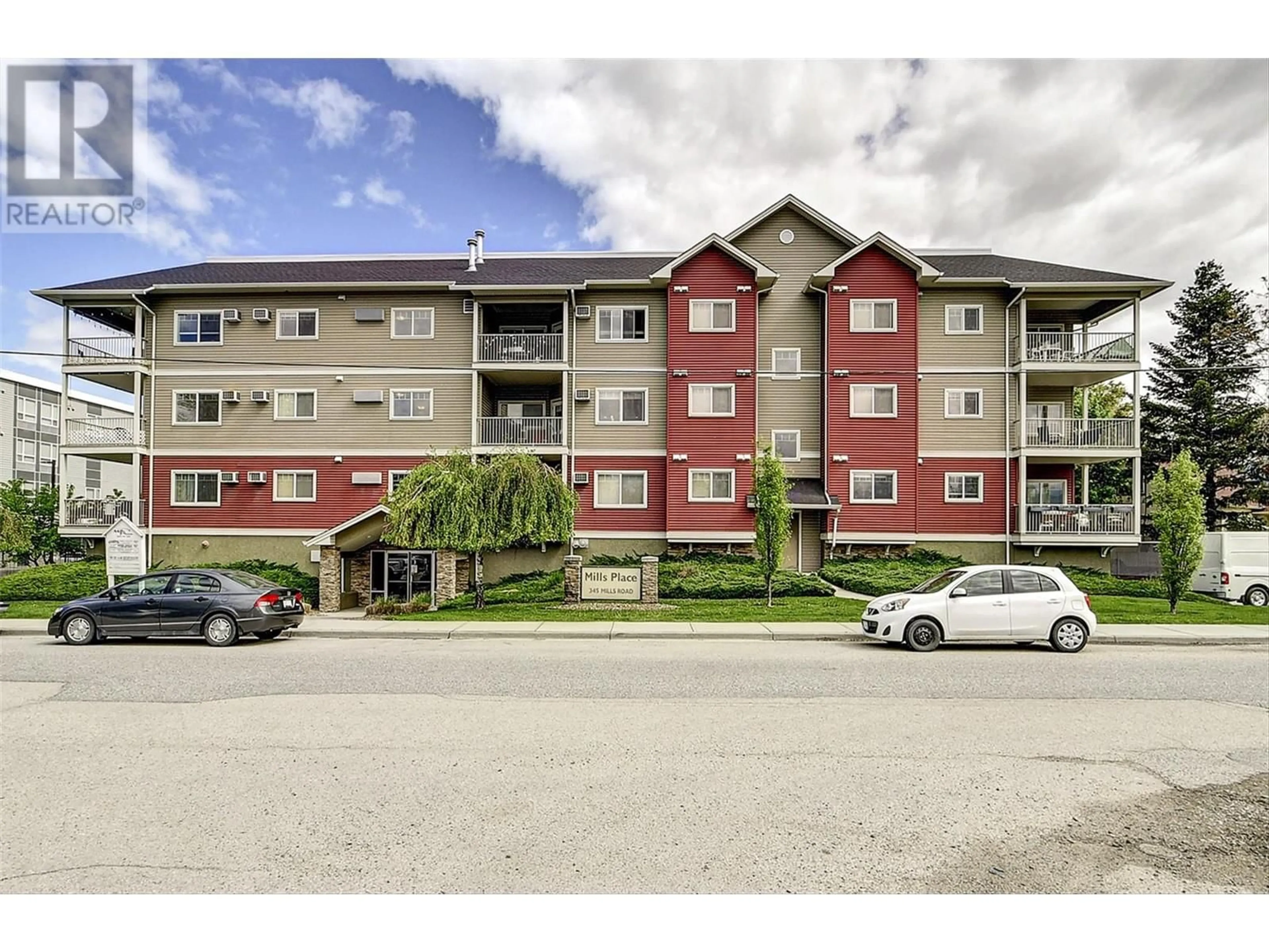 A pic from outside/outdoor area/front of a property/back of a property/a pic from drone, unknown for 345 Mills Road Unit# 305, Kelowna British Columbia V1X4G9