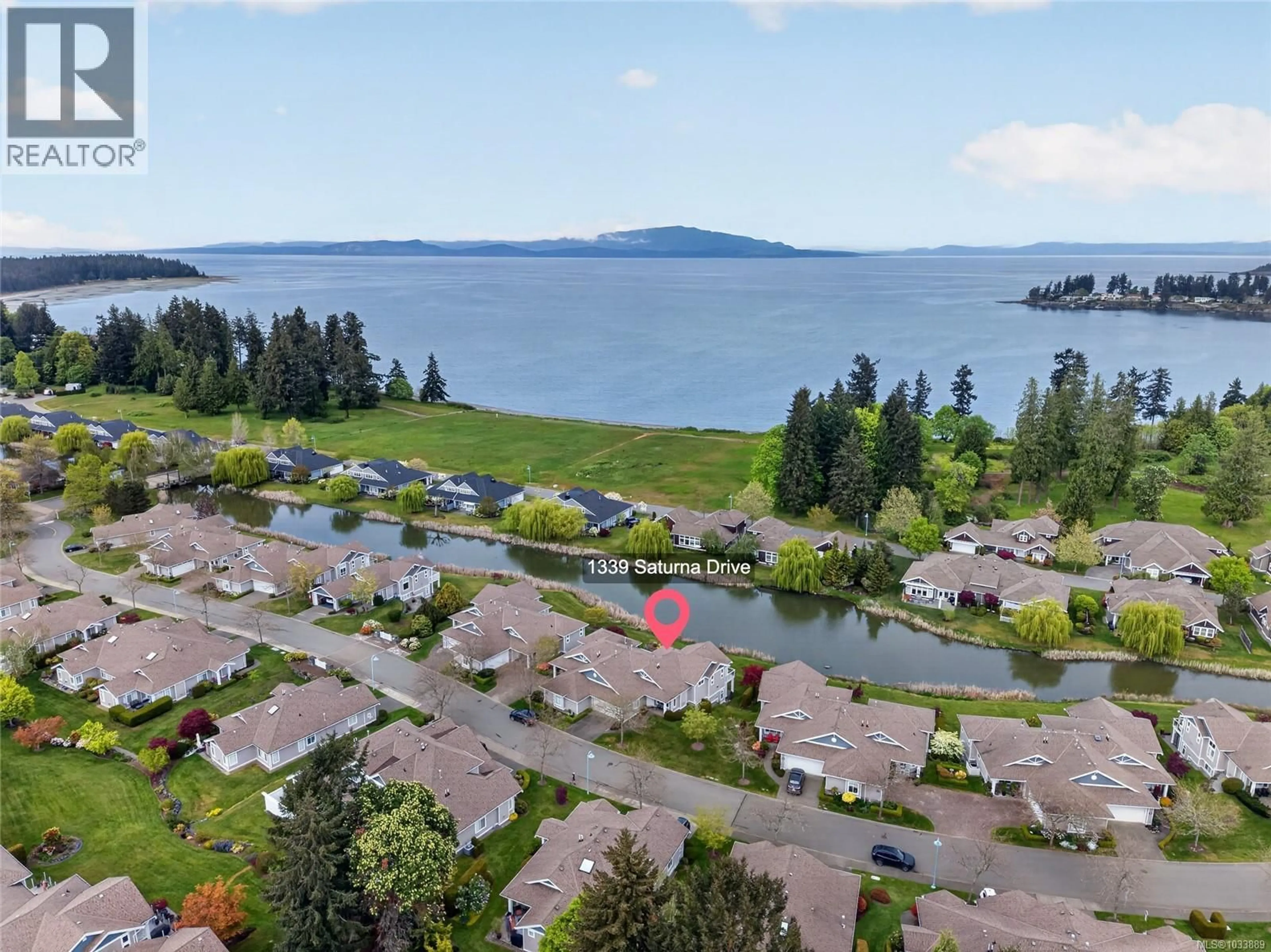 A pic from outside/outdoor area/front of a property/back of a property/a pic from drone, water/lake/river/ocean view for 1339 SATURNA DRIVE, Parksville British Columbia V2P2T9