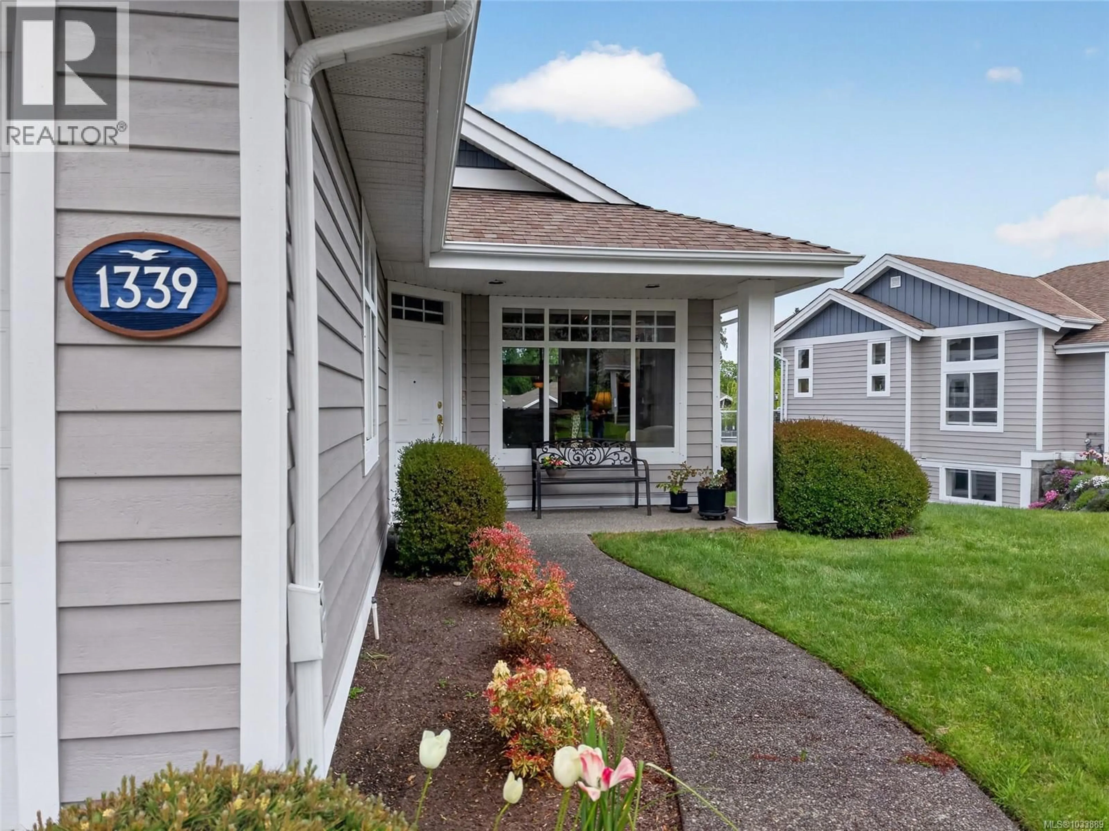 Home with vinyl exterior material, street for 1339 SATURNA DRIVE, Parksville British Columbia V2P2T9