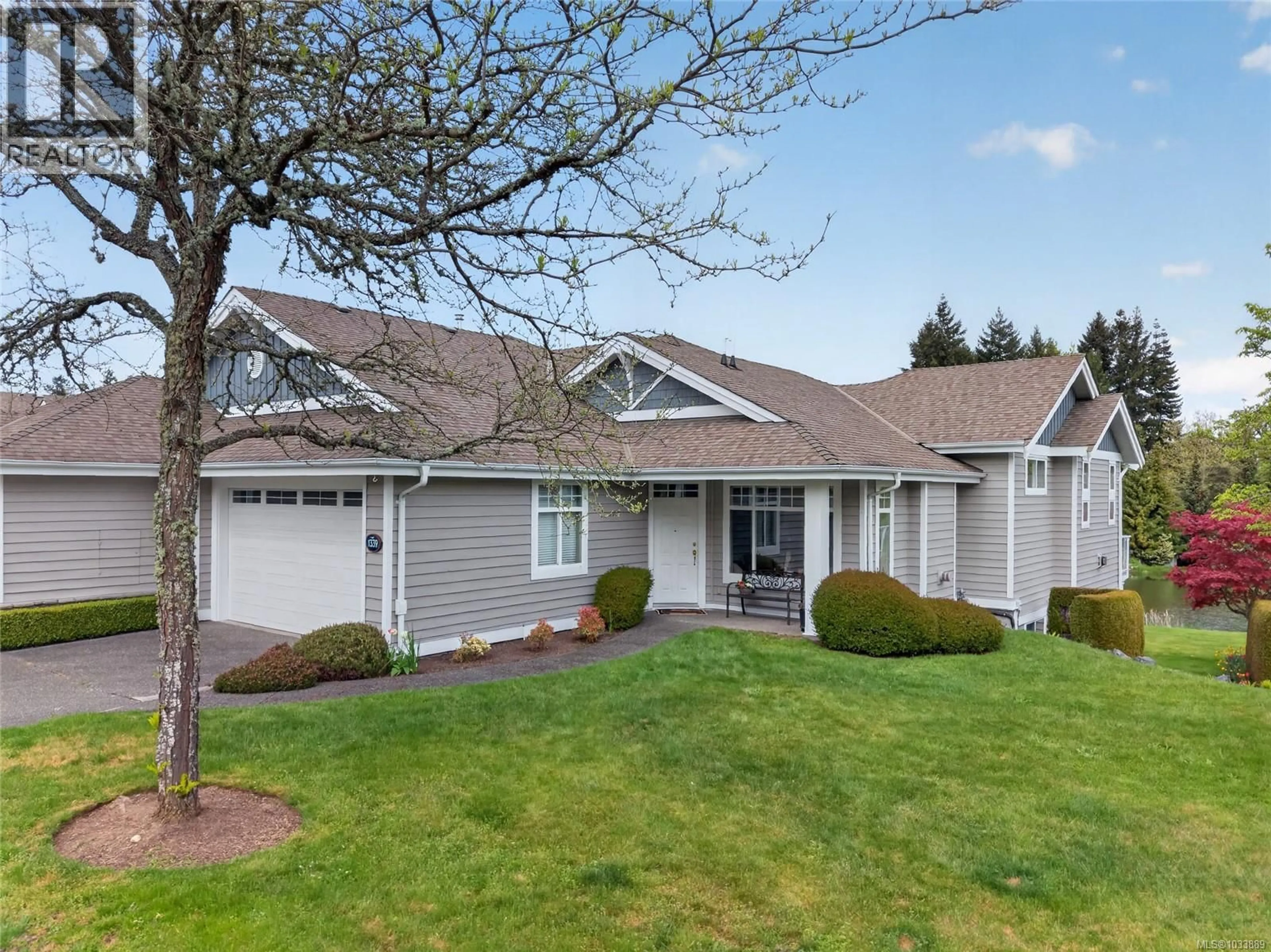 Home with vinyl exterior material, street for 1339 SATURNA DRIVE, Parksville British Columbia V2P2T9