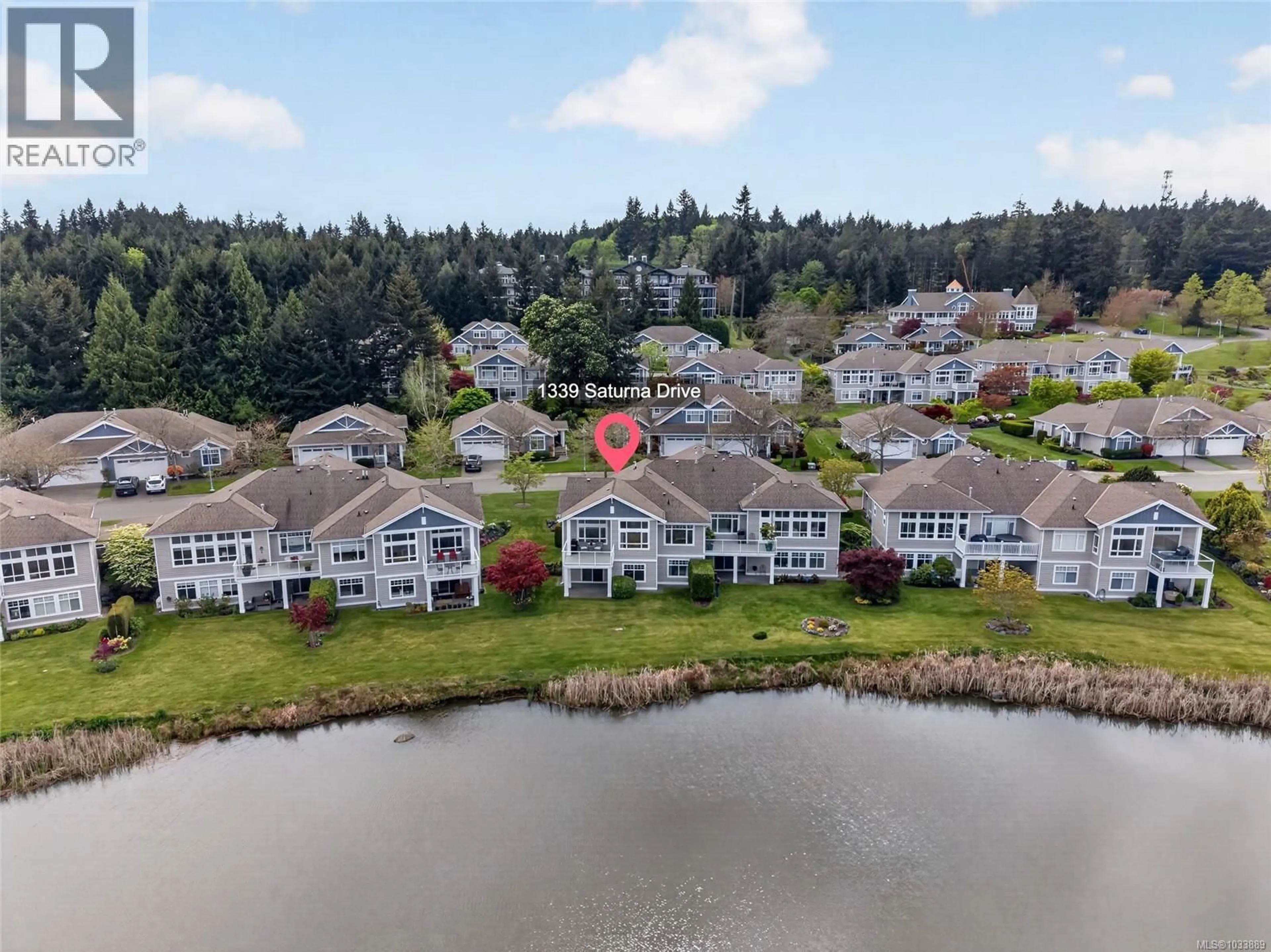 A pic from outside/outdoor area/front of a property/back of a property/a pic from drone, water/lake/river/ocean view for 1339 SATURNA DRIVE, Parksville British Columbia V2P2T9