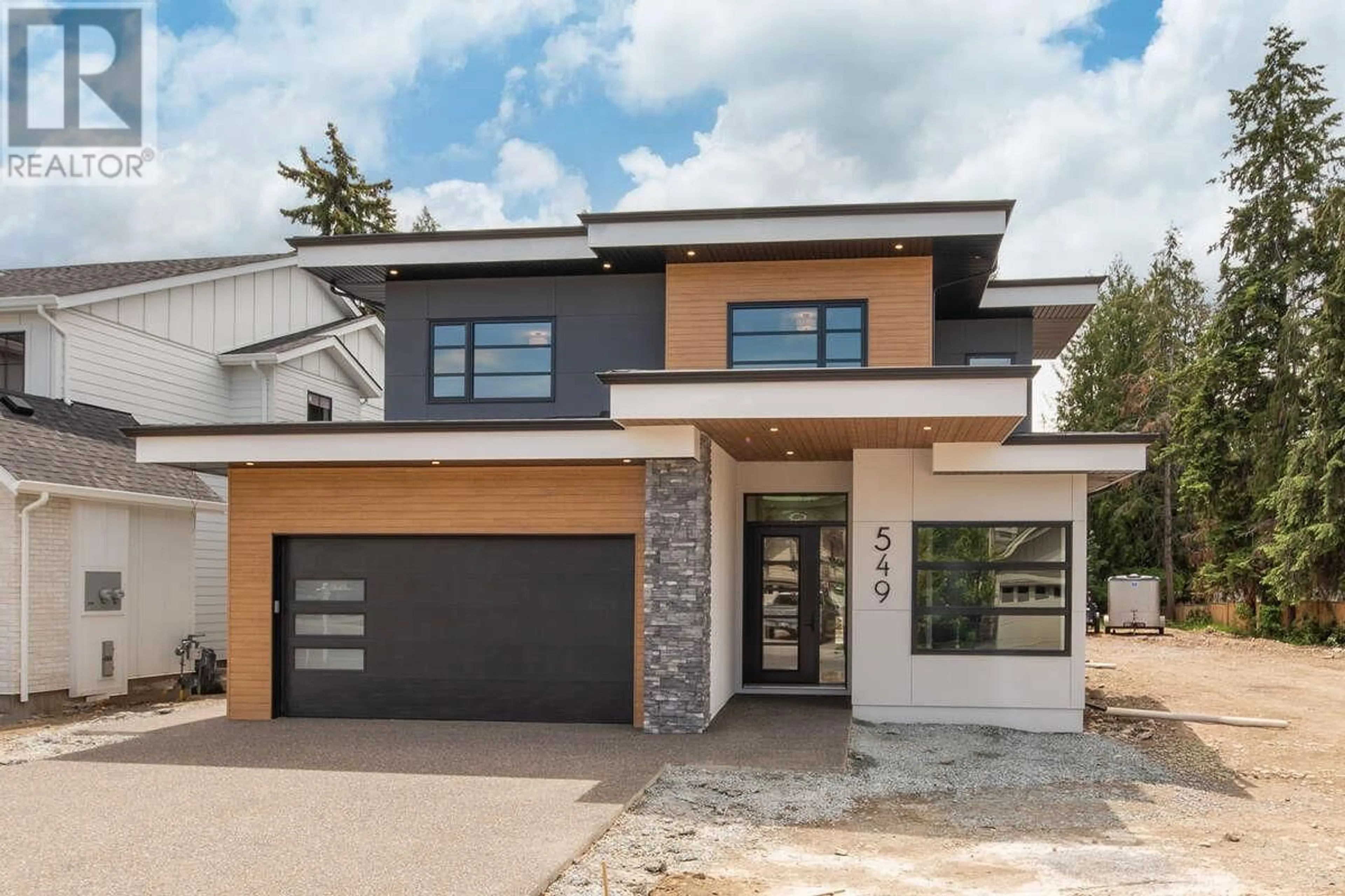 Home with brick exterior material, street for 549 KNOWLES ROAD, Kelowna British Columbia V1W1H4
