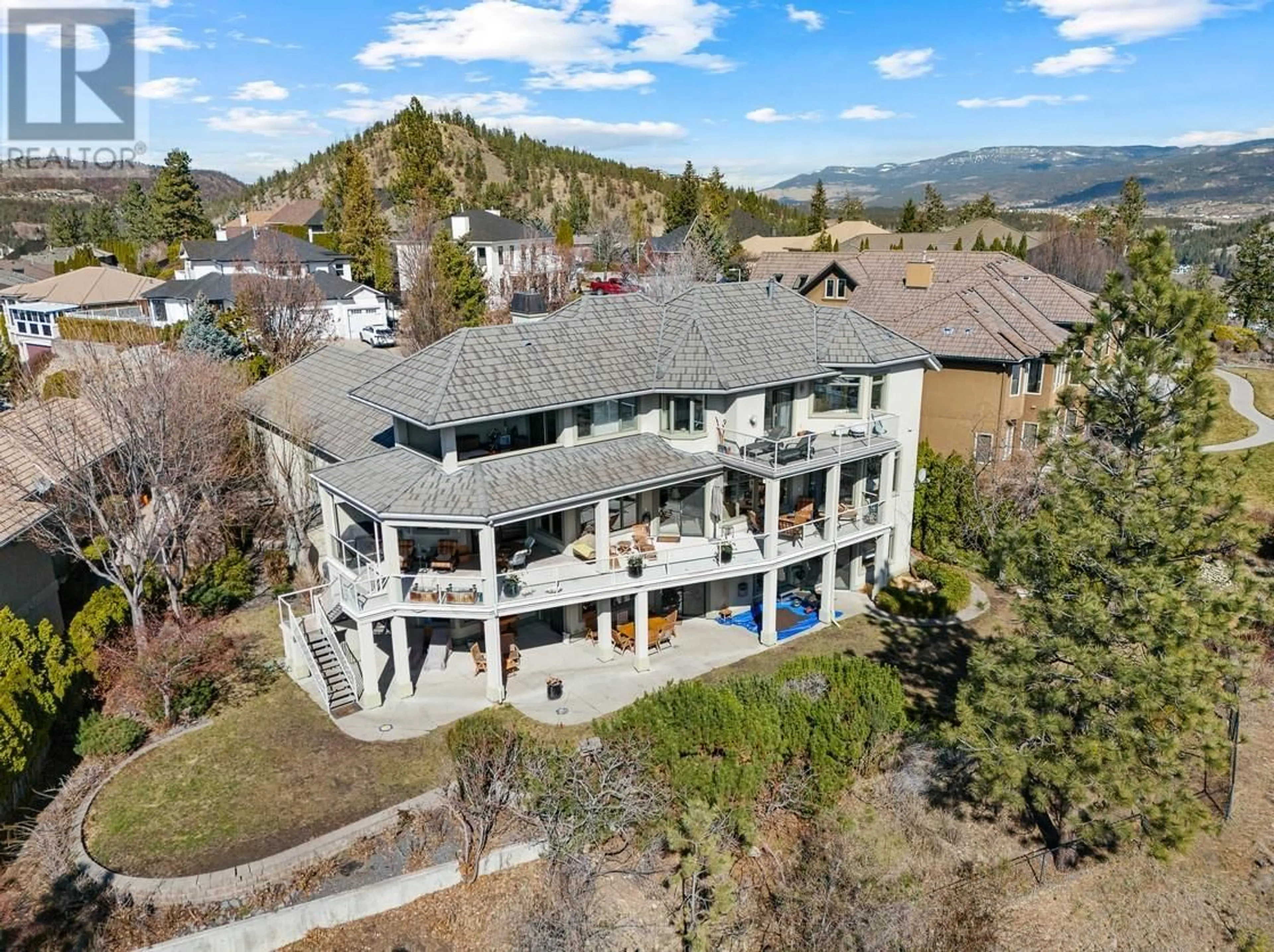 A pic from outside/outdoor area/front of a property/back of a property/a pic from drone, mountain view for 998 SKEENA DRIVE, Kelowna British Columbia V1V2K7