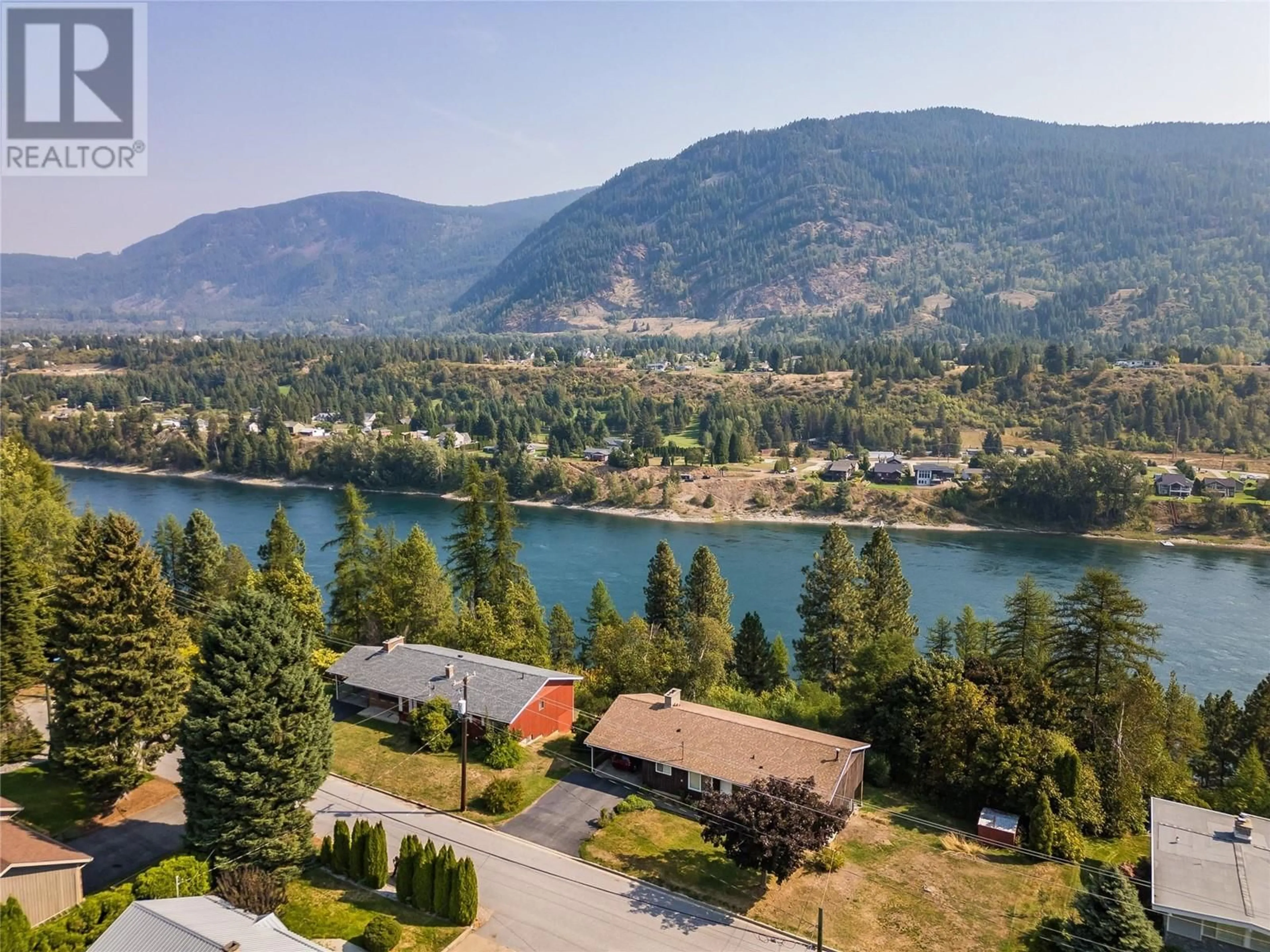 A pic from outside/outdoor area/front of a property/back of a property/a pic from drone, water/lake/river/ocean view for 3305 3RD AVENUE, Castlegar British Columbia V1N2R5