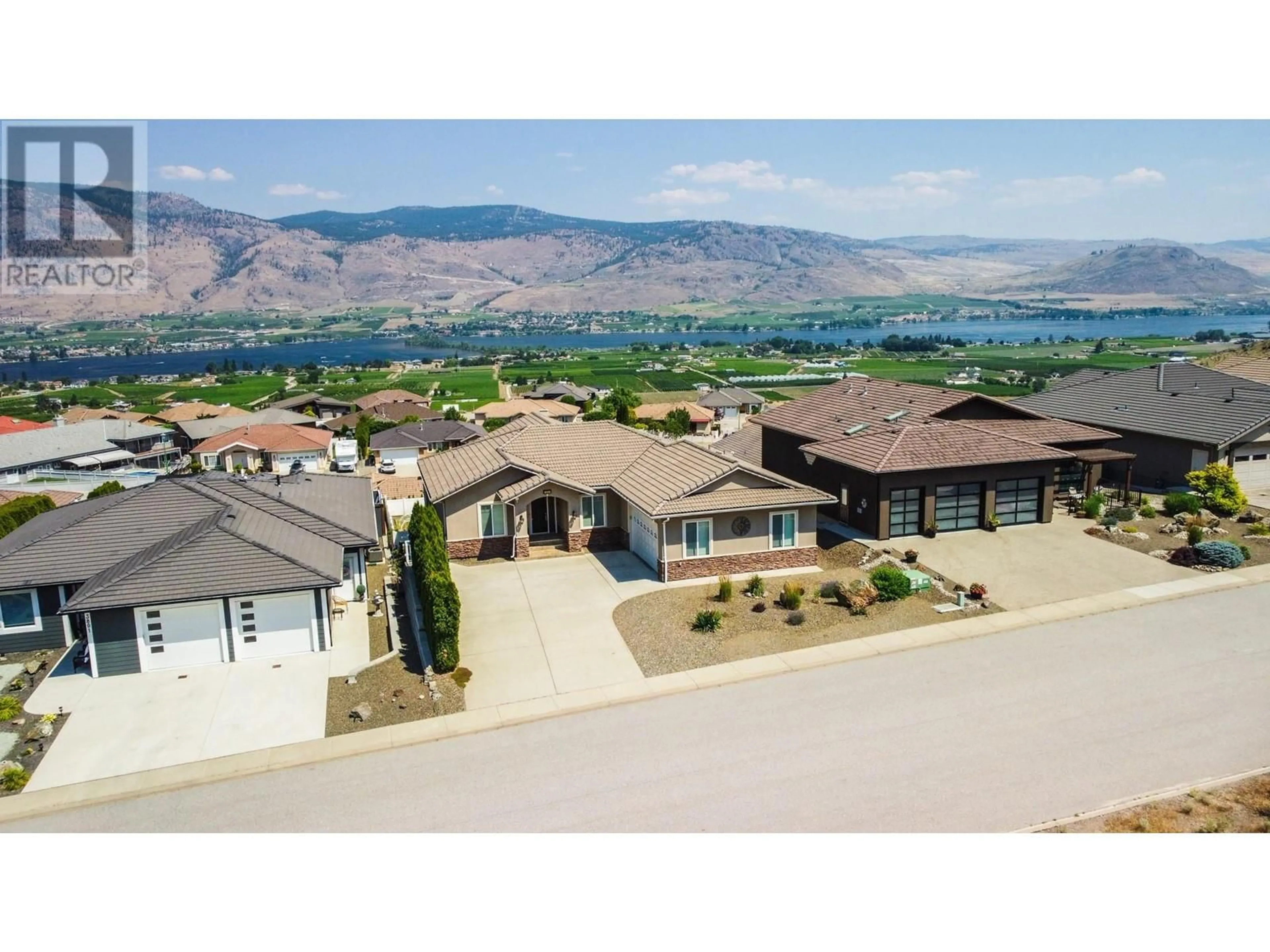 A pic from outside/outdoor area/front of a property/back of a property/a pic from drone, mountain view for 3631 SAWGRASS DRIVE, Osoyoos British Columbia V0H1V4