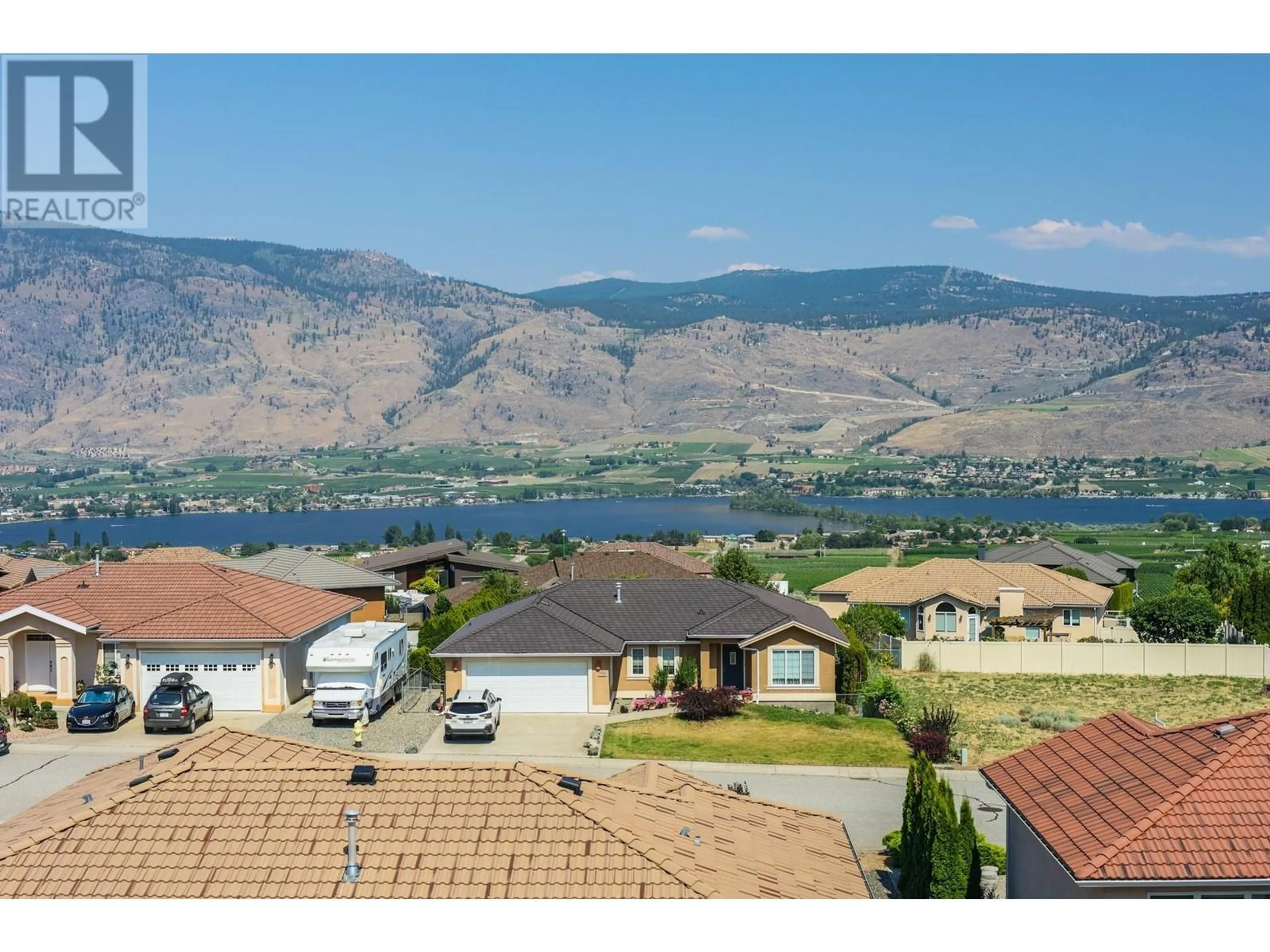 A pic from outside/outdoor area/front of a property/back of a property/a pic from drone, water/lake/river/ocean view for 3631 SAWGRASS DRIVE, Osoyoos British Columbia V0H1V4