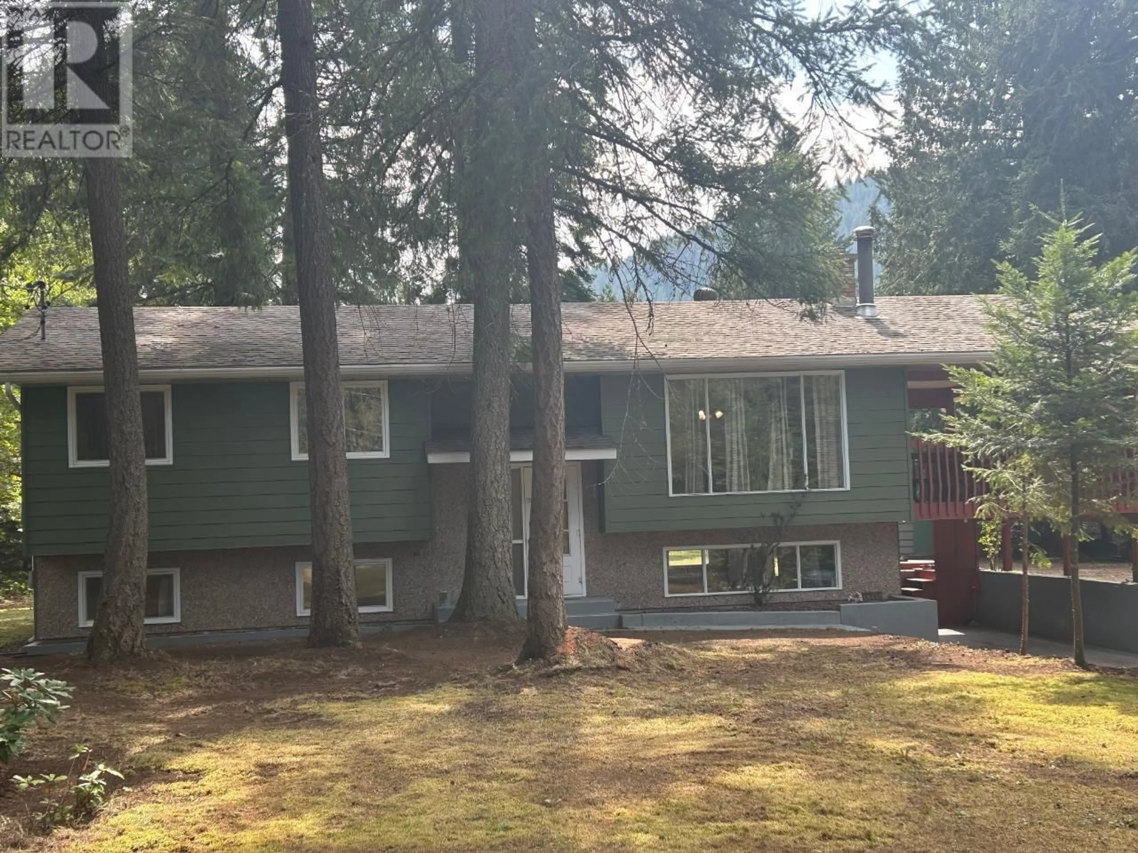 Home with vinyl exterior material, forest/trees view for 1055 WHITE ROAD, South Slocan British Columbia V0G2G0