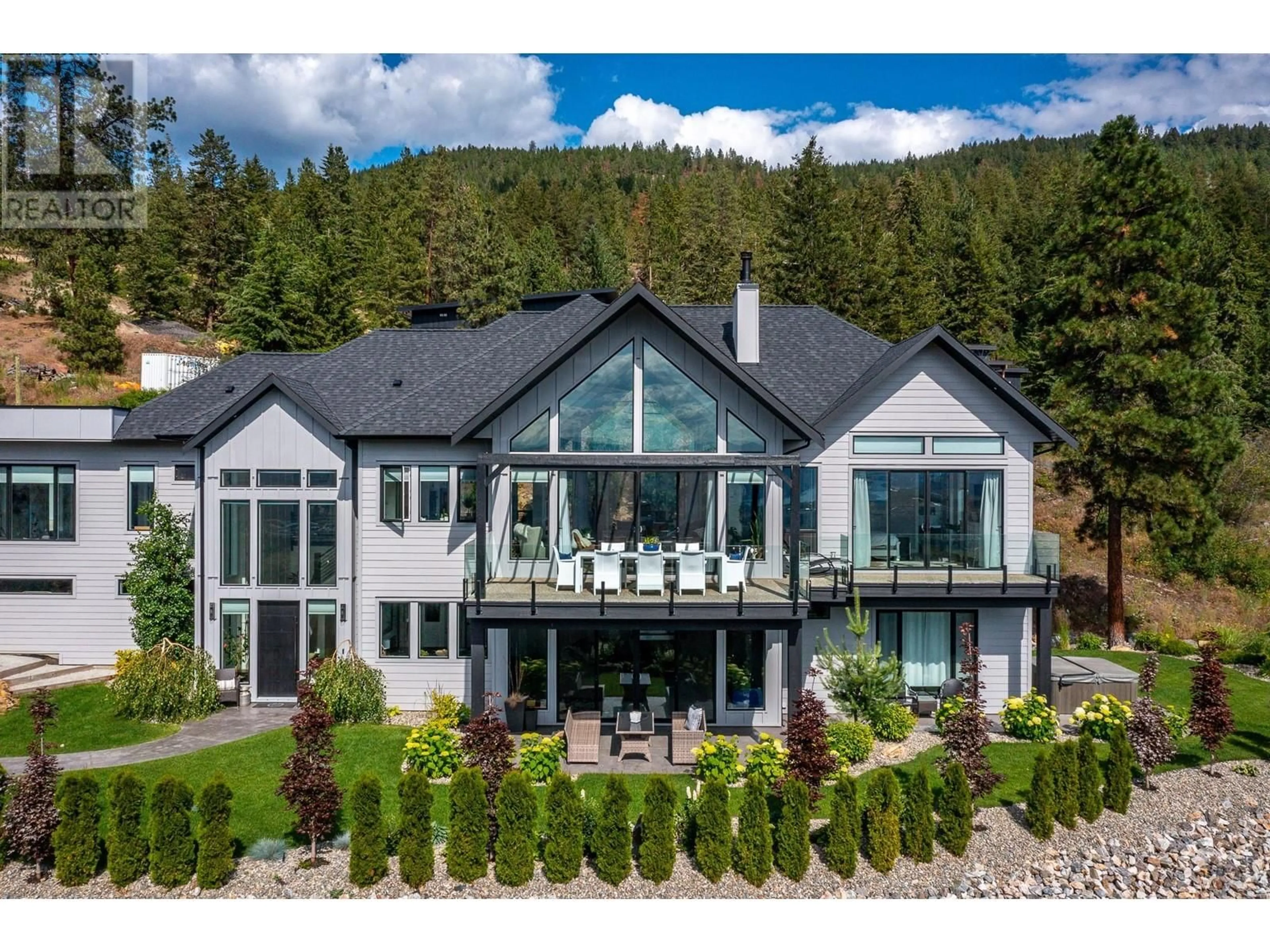 A pic from outside/outdoor area/front of a property/back of a property/a pic from drone, mountain view for 3965 BOSS CREEK ROAD, Vernon British Columbia V1B4G5