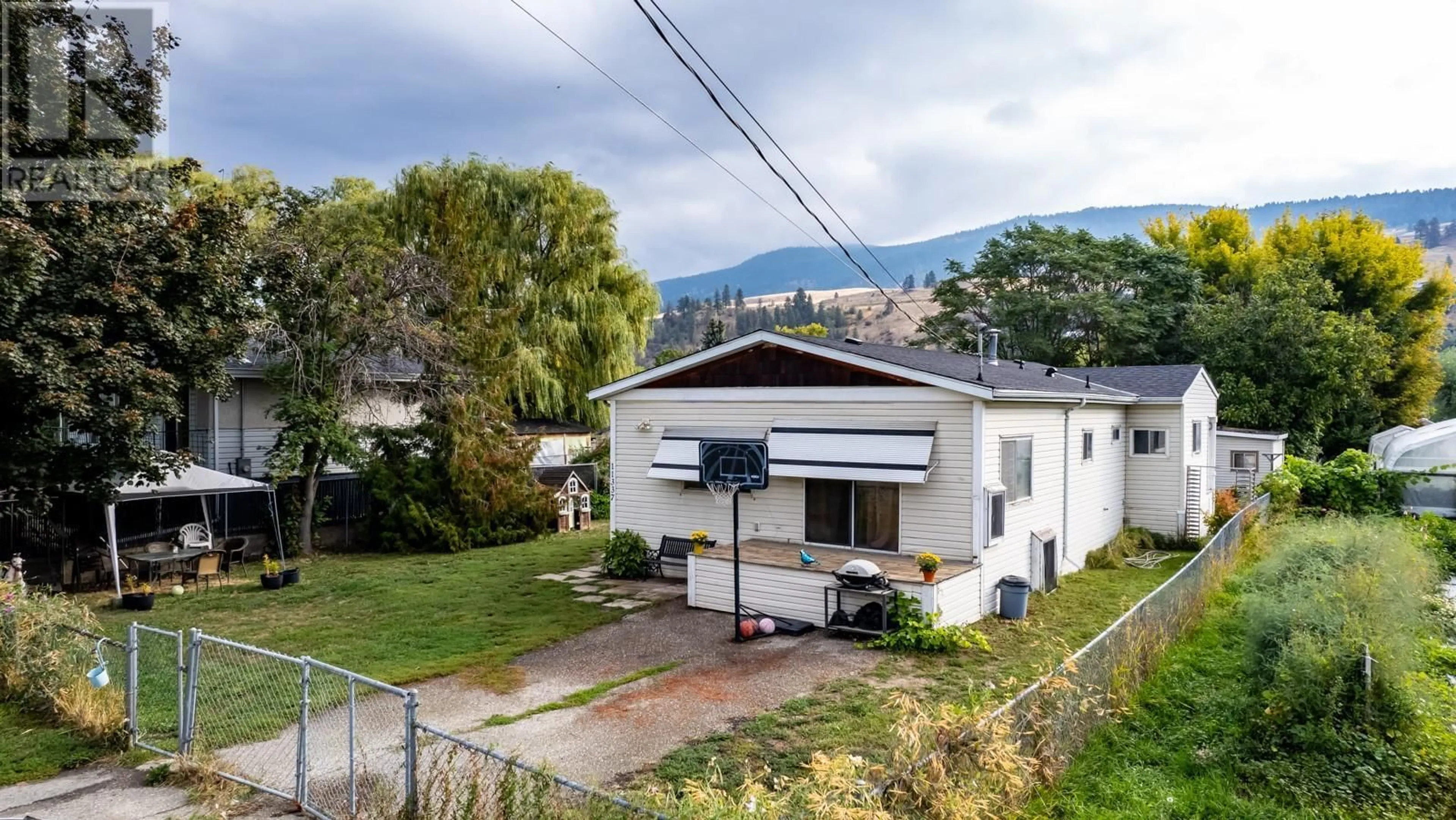 A pic from outside/outdoor area/front of a property/back of a property/a pic from drone, mountain view for 11337 REISWIG ROAD, Lake Country British Columbia V4V1X5