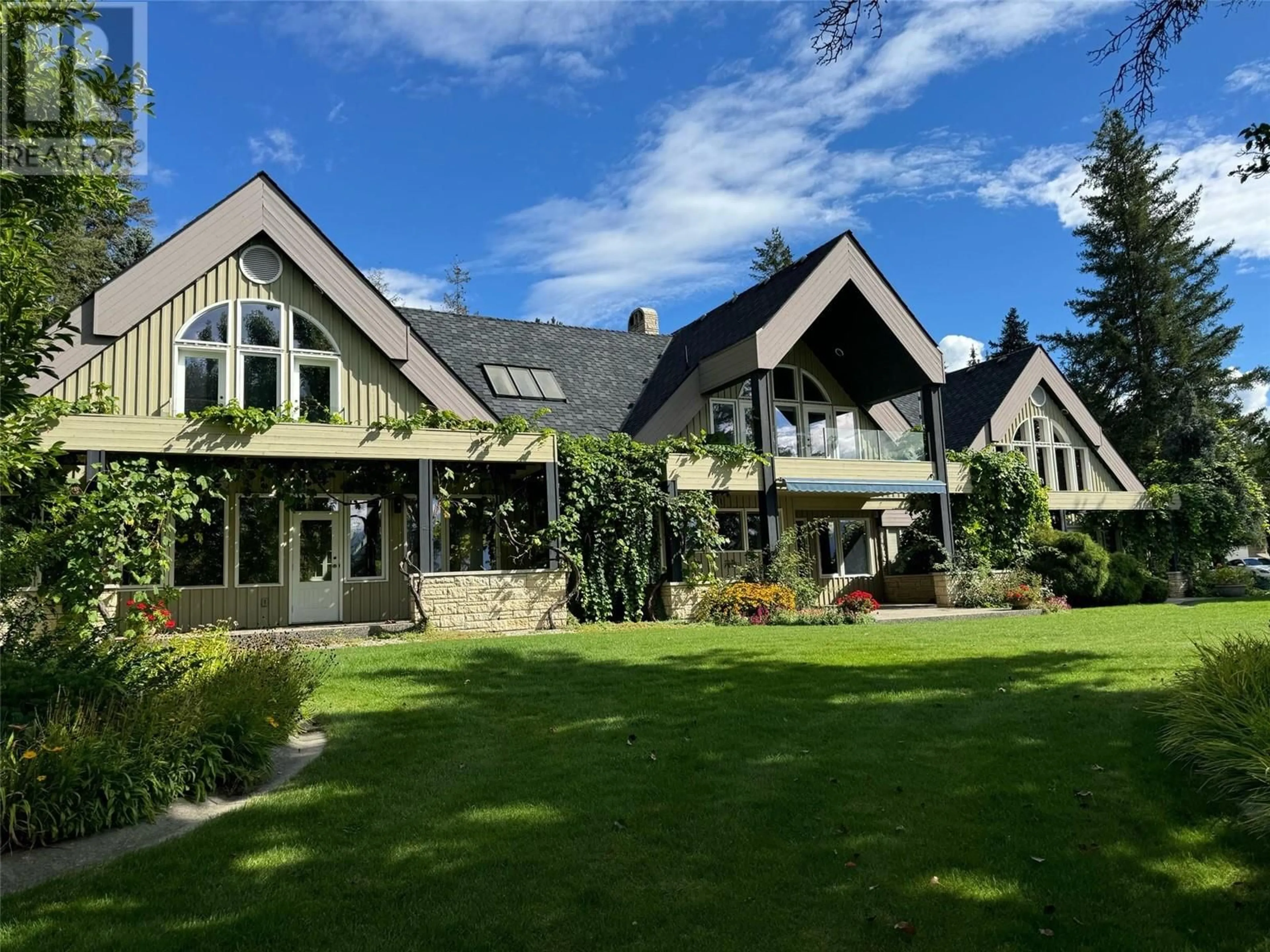 A pic from outside/outdoor area/front of a property/back of a property/a pic from drone, mountain view for 2391 26 Avenue NE, Salmon Arm British Columbia V1E2S6