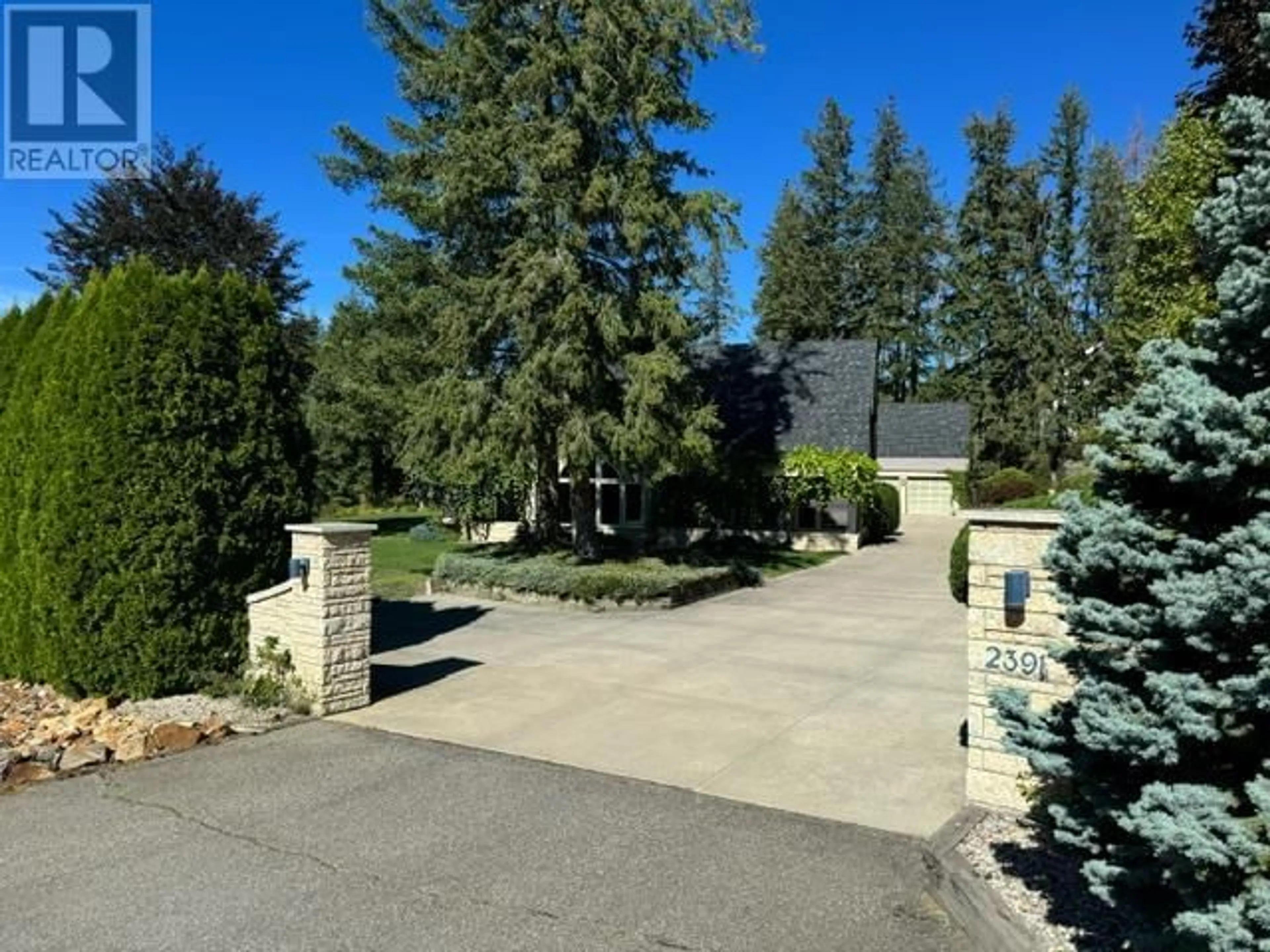 A pic from outside/outdoor area/front of a property/back of a property/a pic from drone, street for 2391 26 Avenue NE, Salmon Arm British Columbia V1E2S6