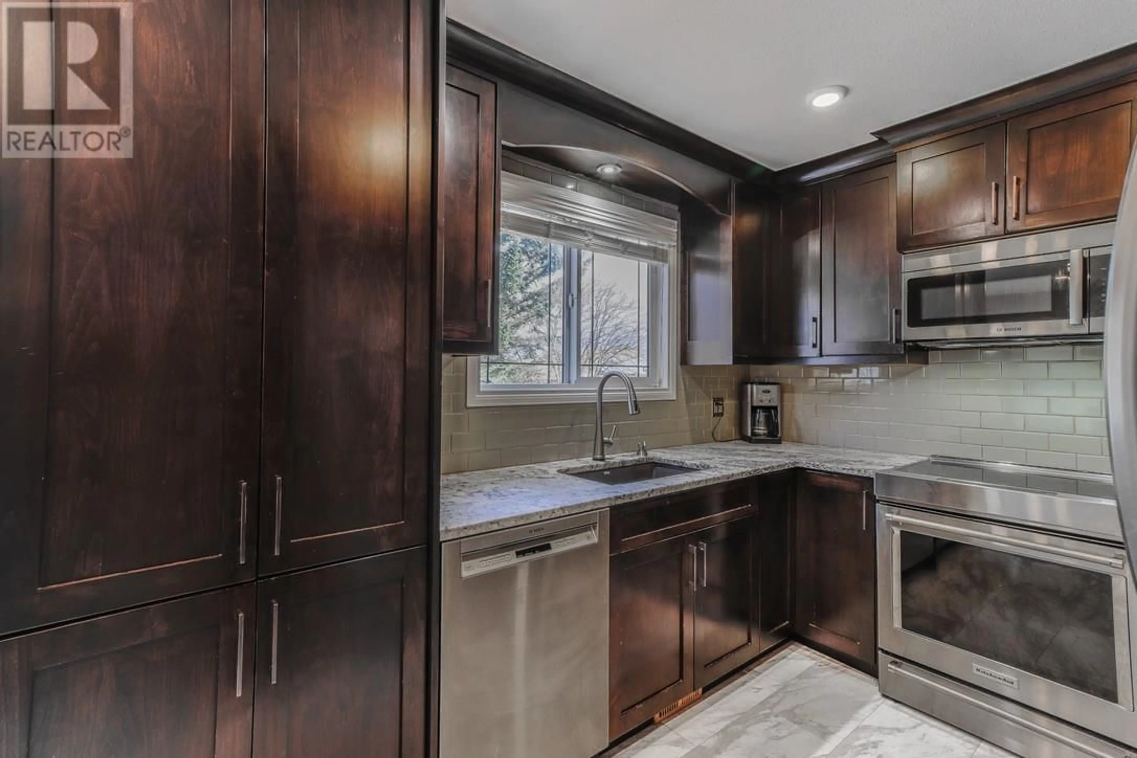 Contemporary kitchen, ceramic/tile floor for 817 13TH STREET SOUTH STREET, Cranbrook British Columbia V1C1X4