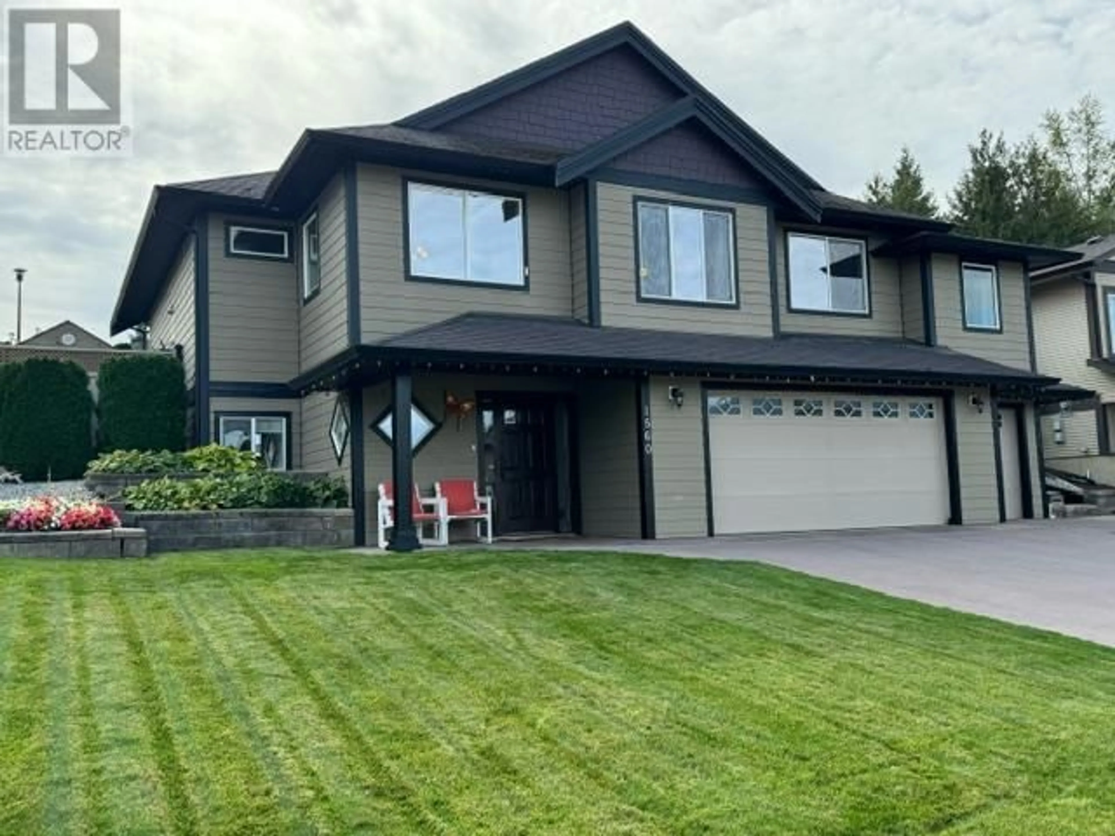 Home with vinyl exterior material, mountain view for 1560 24 Street NE, Salmon Arm British Columbia V1E0A8