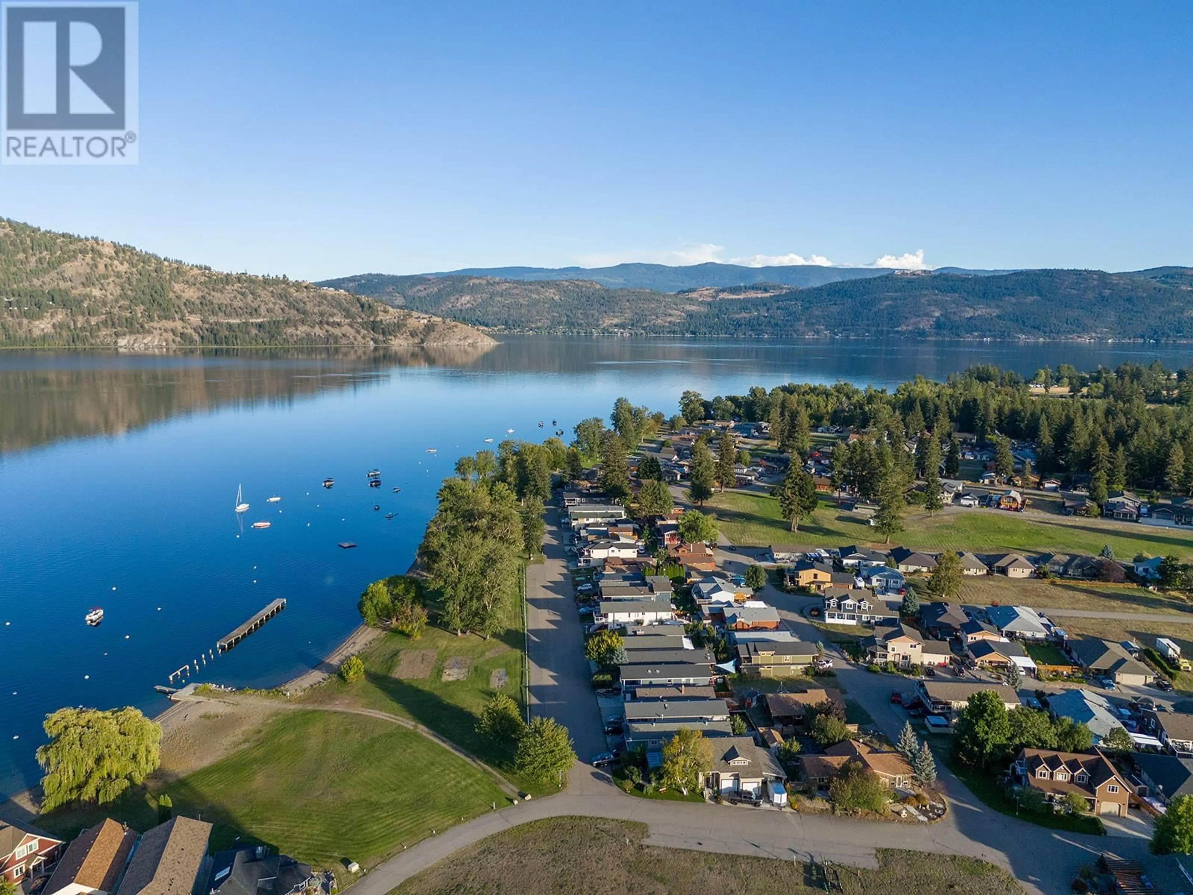 A pic from outside/outdoor area/front of a property/back of a property/a pic from drone, water/lake/river/ocean view for 6 LAKESHORE DRIVE, Vernon British Columbia V1H2A1