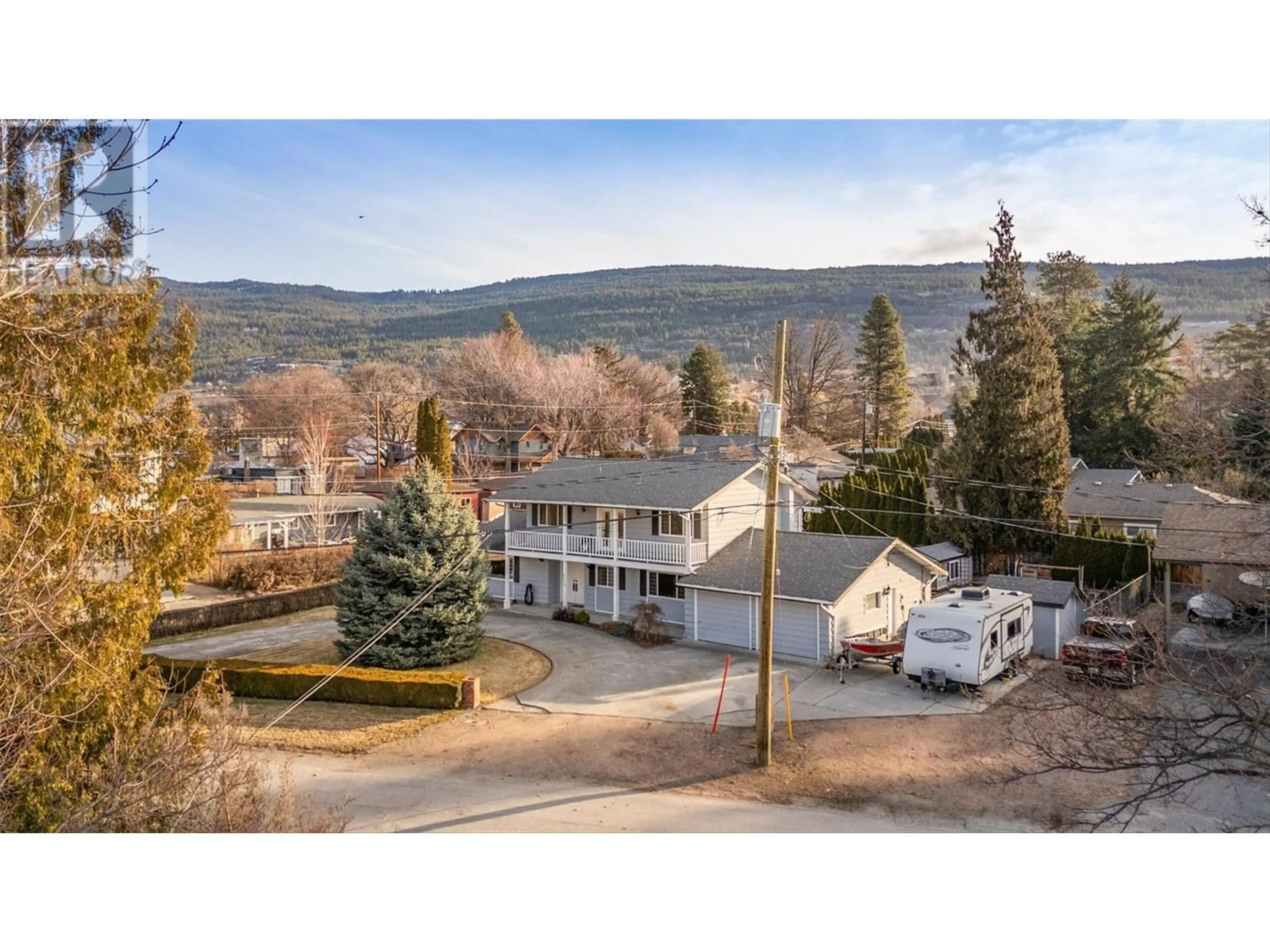 A pic from outside/outdoor area/front of a property/back of a property/a pic from drone, mountain view for 3570 1ST STREET, Naramata British Columbia V0H1N1