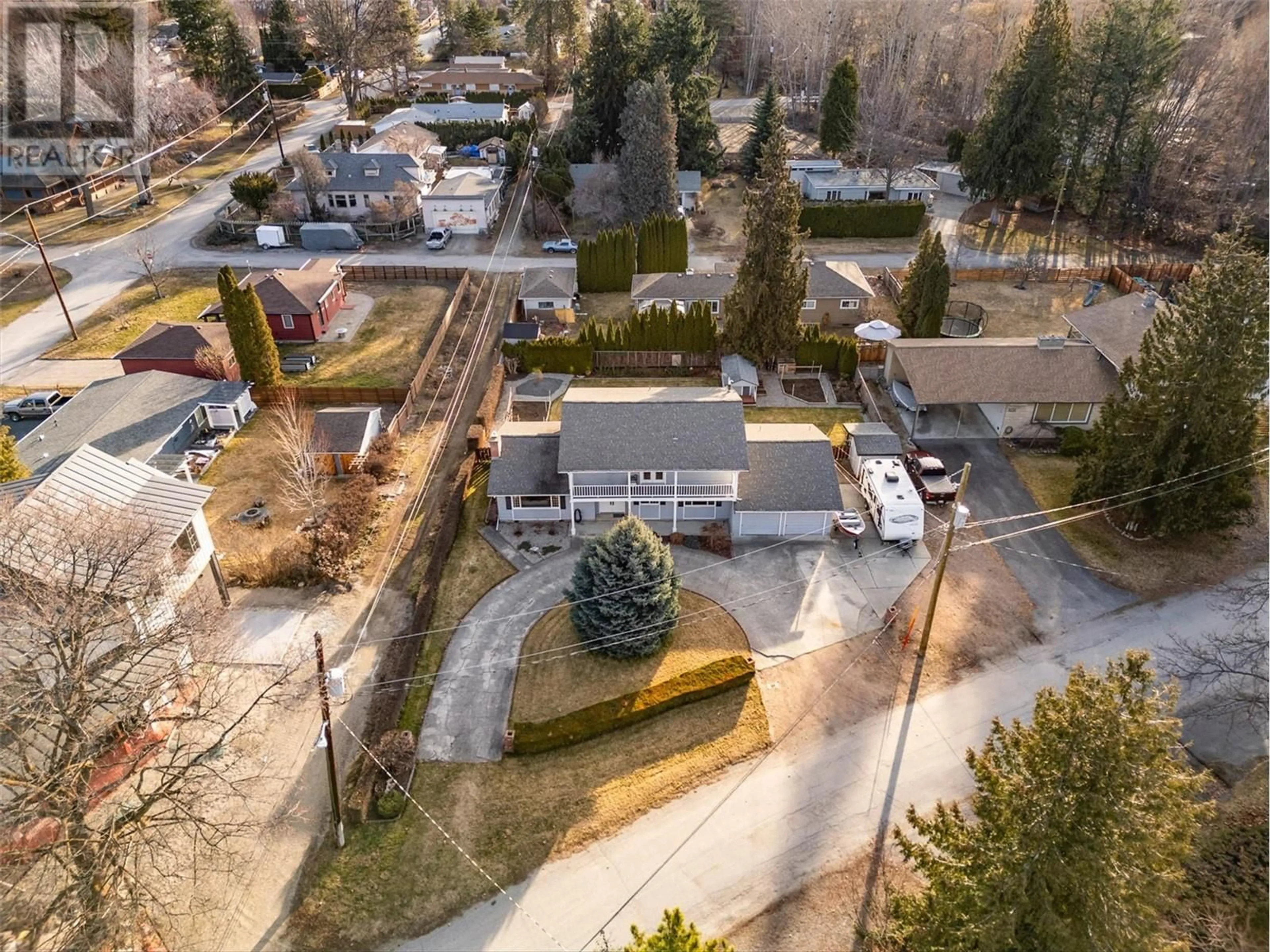 A pic from outside/outdoor area/front of a property/back of a property/a pic from drone, street for 3570 1ST STREET, Naramata British Columbia V0H1N1