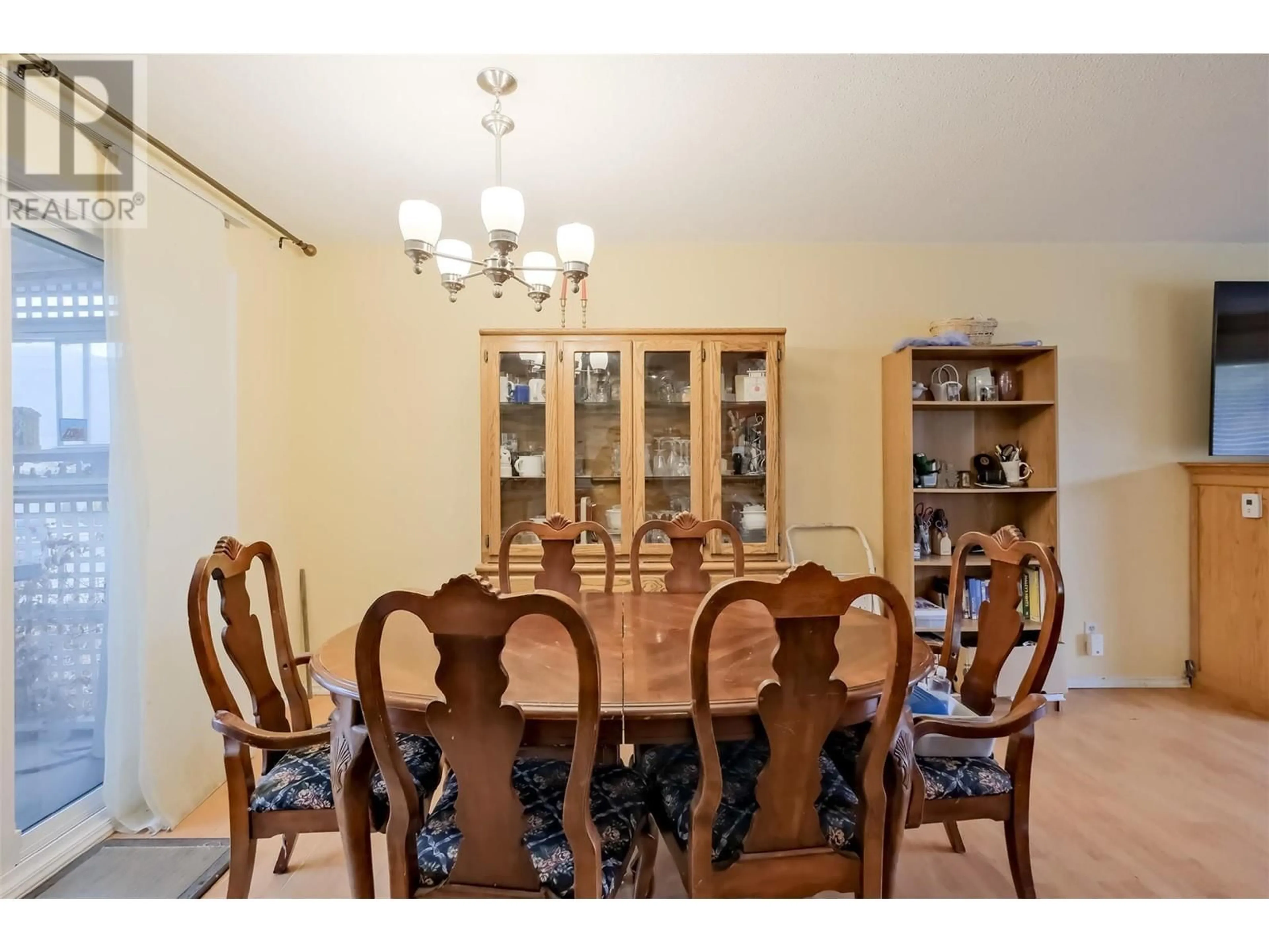 Dining room, wood/laminate floor for 11813 READ CRESCENT, Summerland British Columbia V0H1Z2