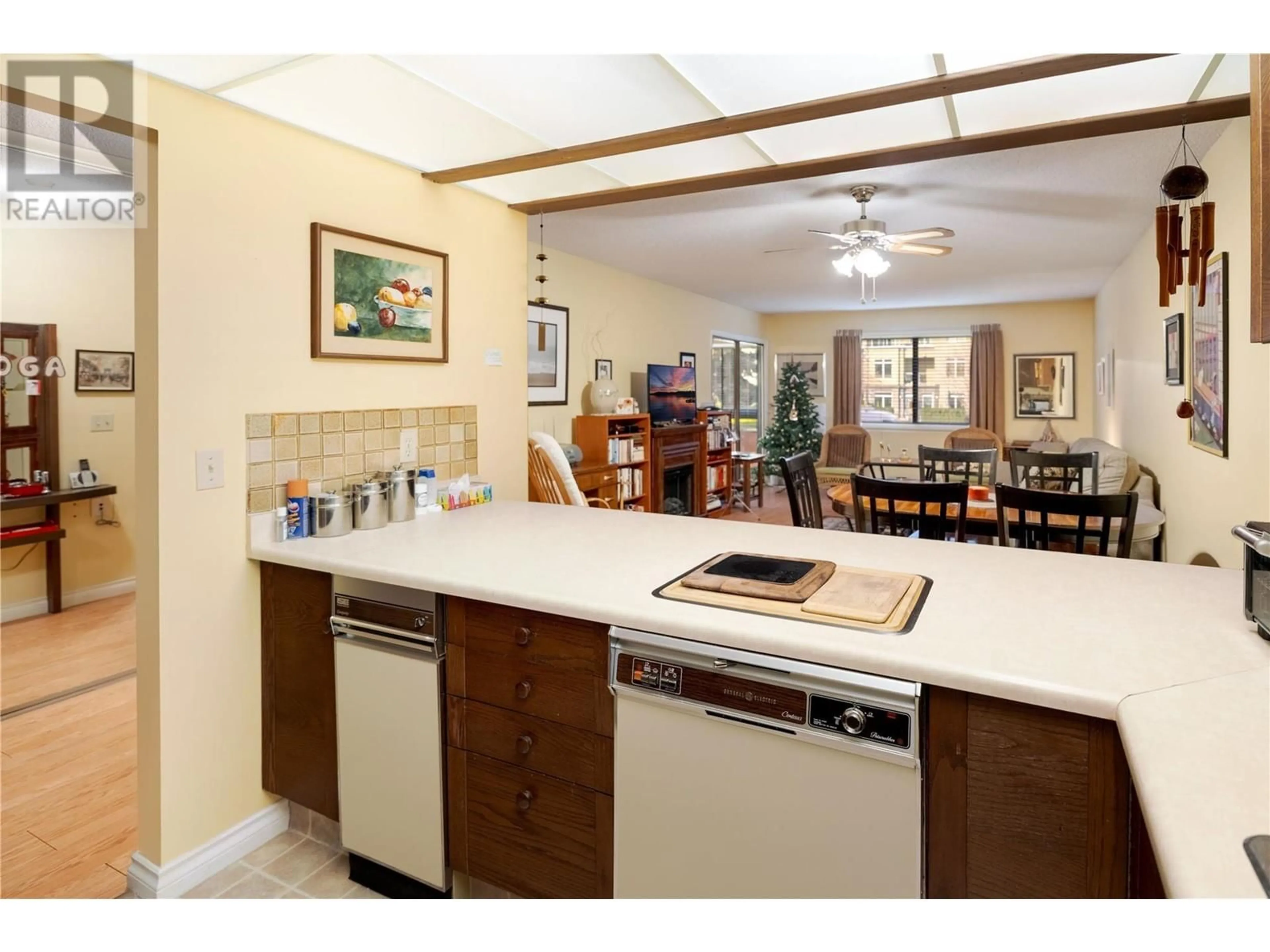 Open concept kitchen, ceramic/tile floor for 111 - 1035 BERNARD AVENUE, Kelowna British Columbia V1Y6P7