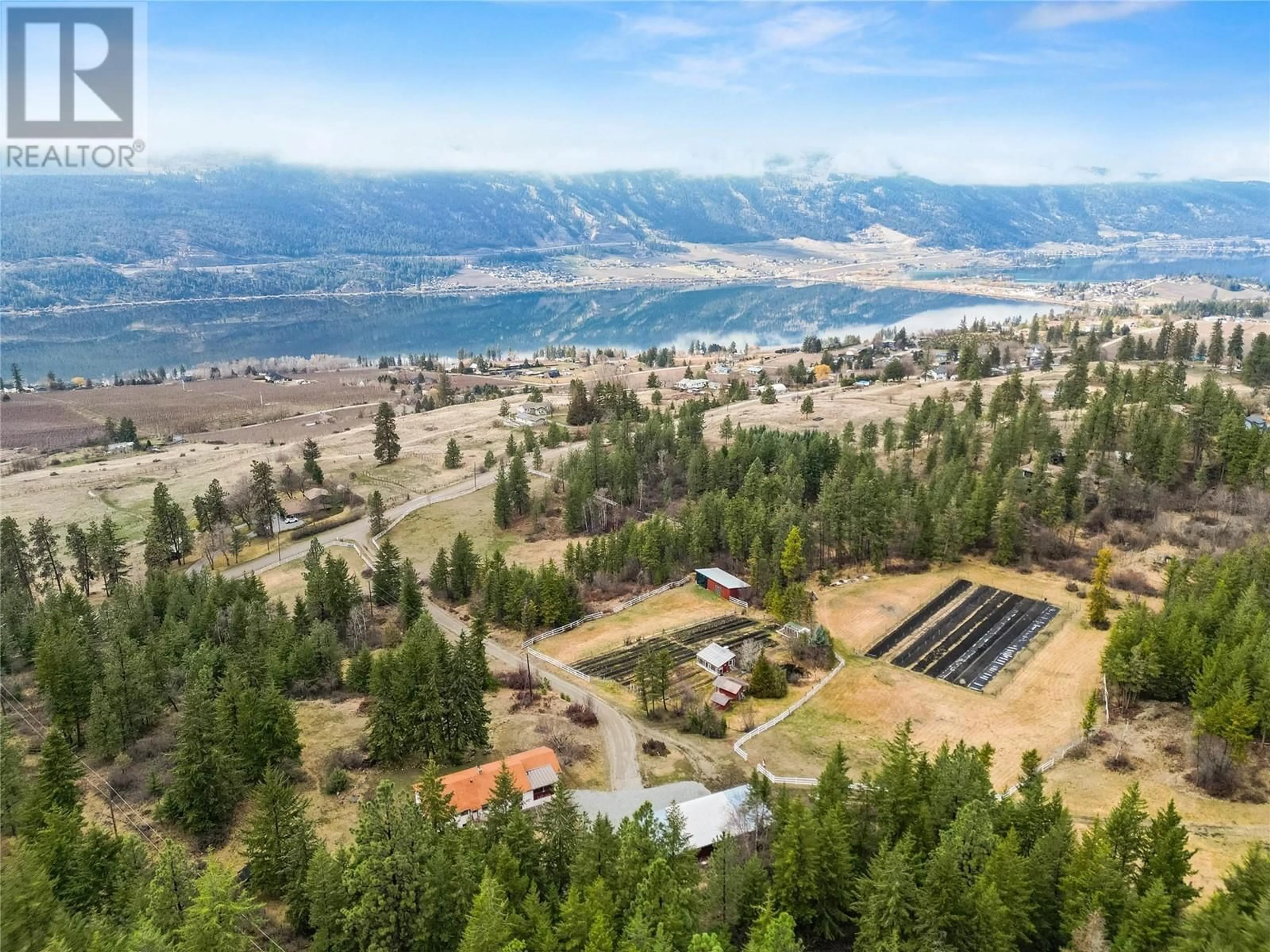 A pic from outside/outdoor area/front of a property/back of a property/a pic from drone, mountain view for 13821 TALBOT ROAD, Lake Country British Columbia V4V2C2