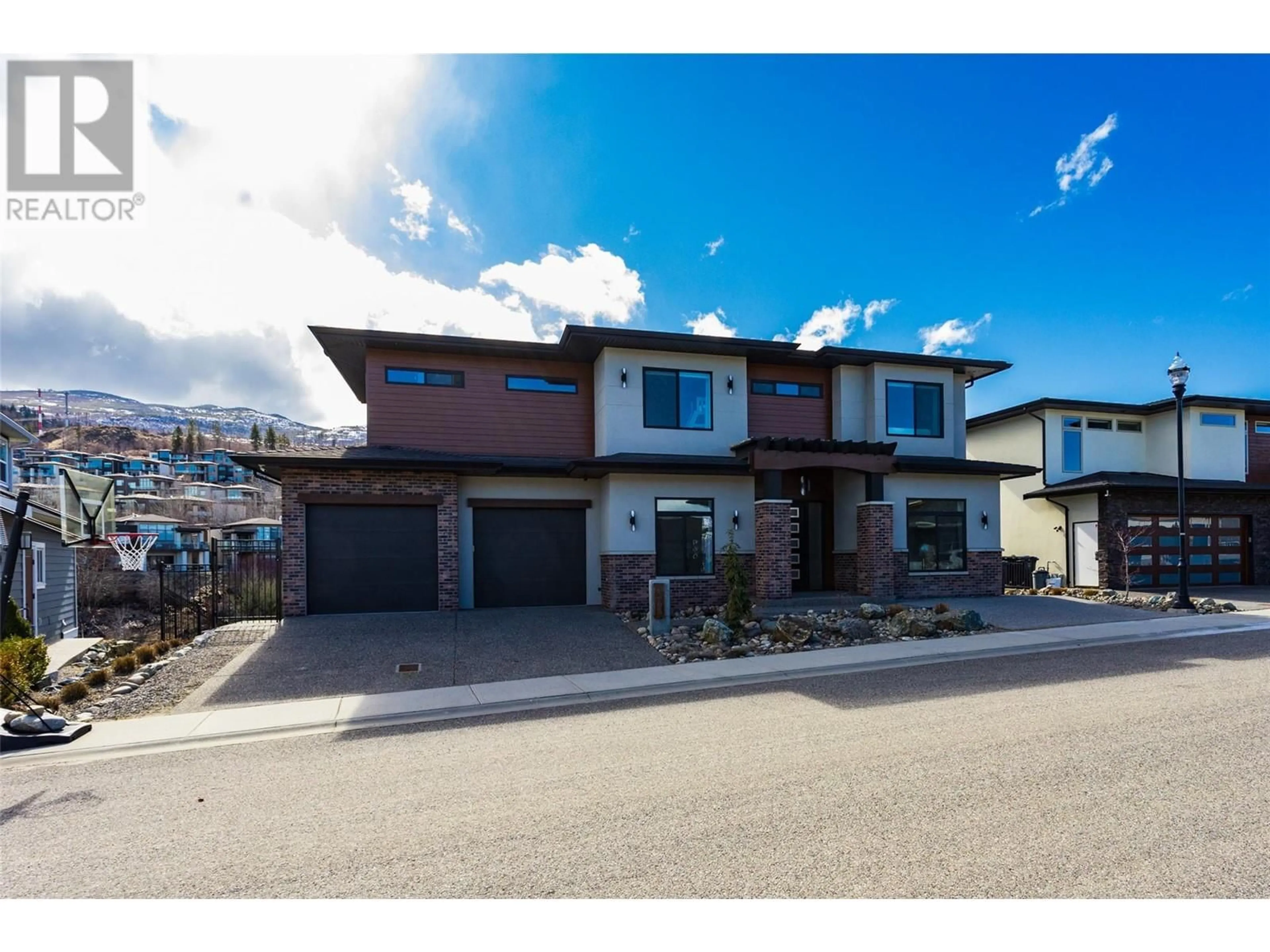 Home with brick exterior material, street for 465 SWAN DRIVE, Kelowna British Columbia V1W5L9