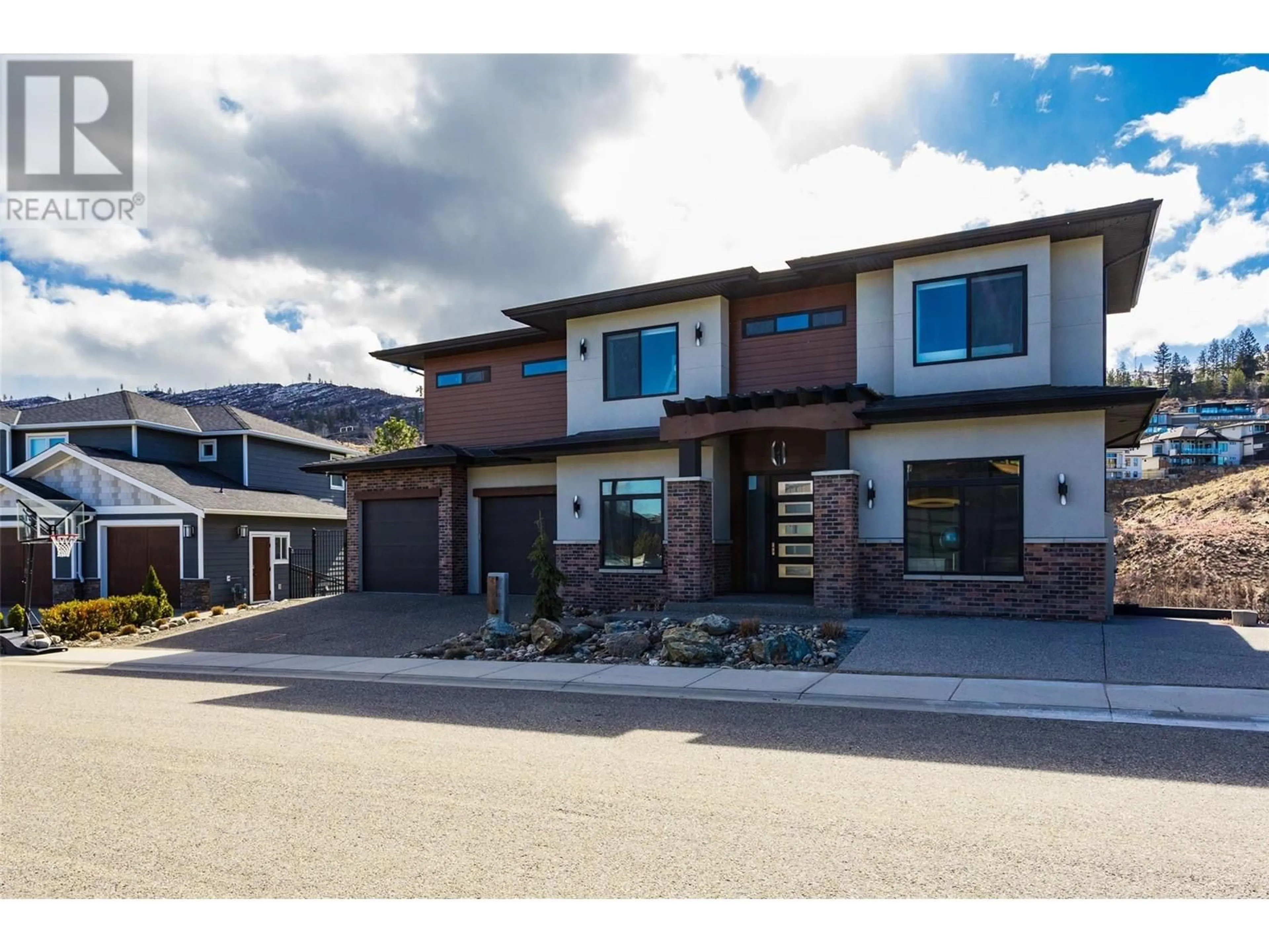 Home with brick exterior material, street for 465 SWAN DRIVE, Kelowna British Columbia V1W5L9