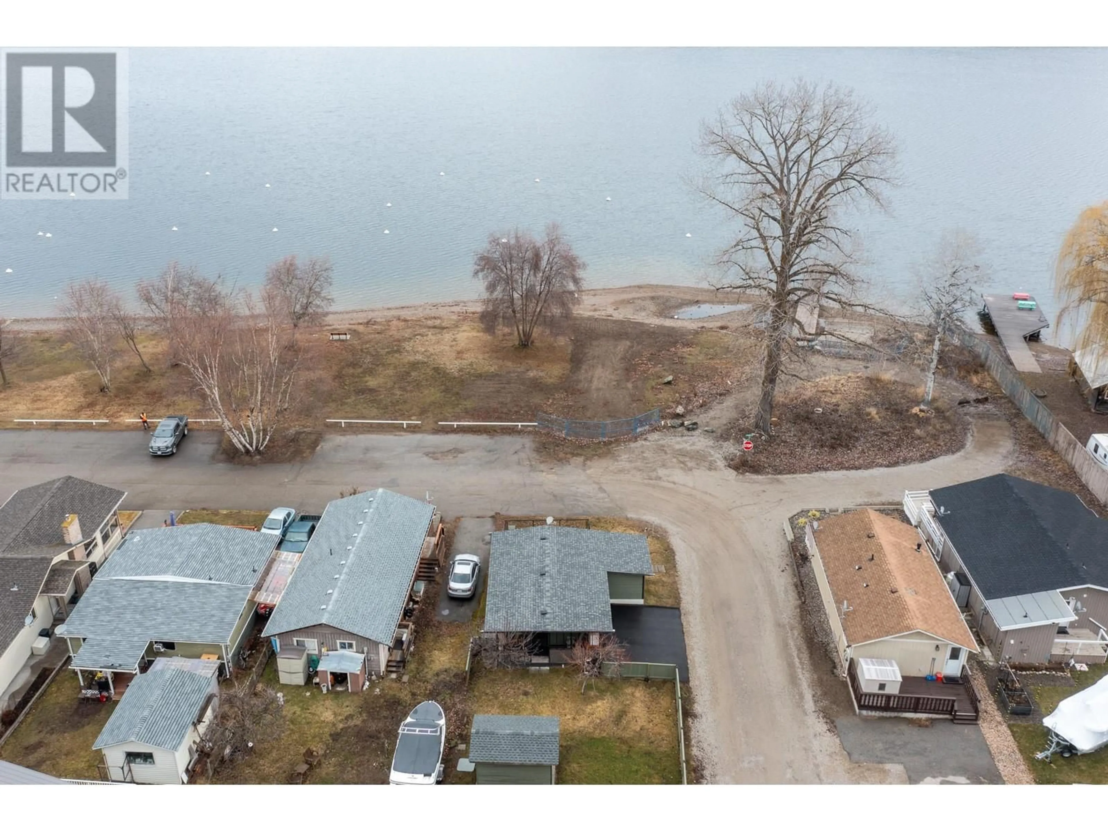 A pic from outside/outdoor area/front of a property/back of a property/a pic from drone, unknown for 53 LAKESHORE DRIVE, Vernon British Columbia V1H2A1