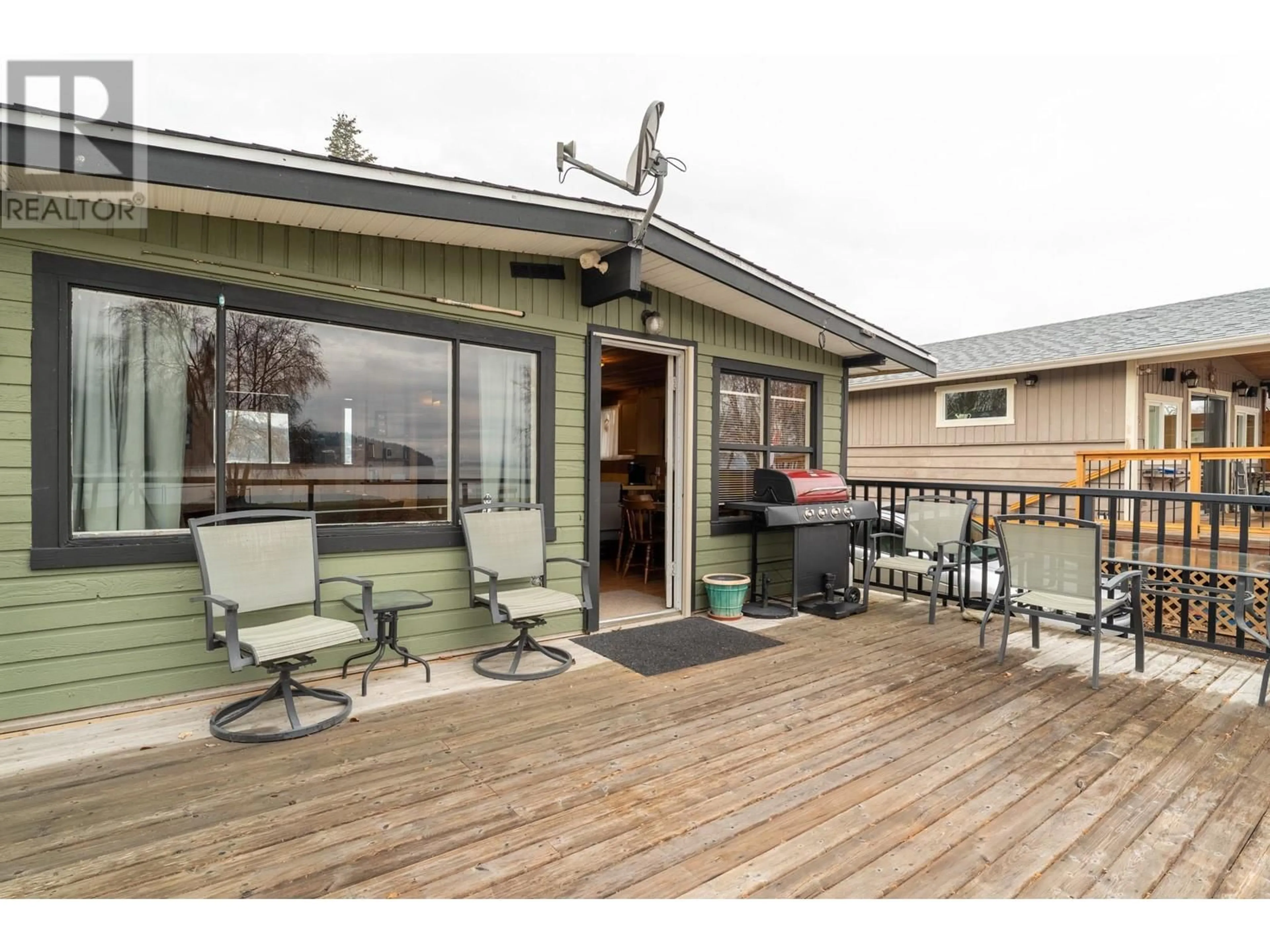 A pic from outside/outdoor area/front of a property/back of a property/a pic from drone, water/lake/river/ocean view for 53 LAKESHORE DRIVE, Vernon British Columbia V1H2A1