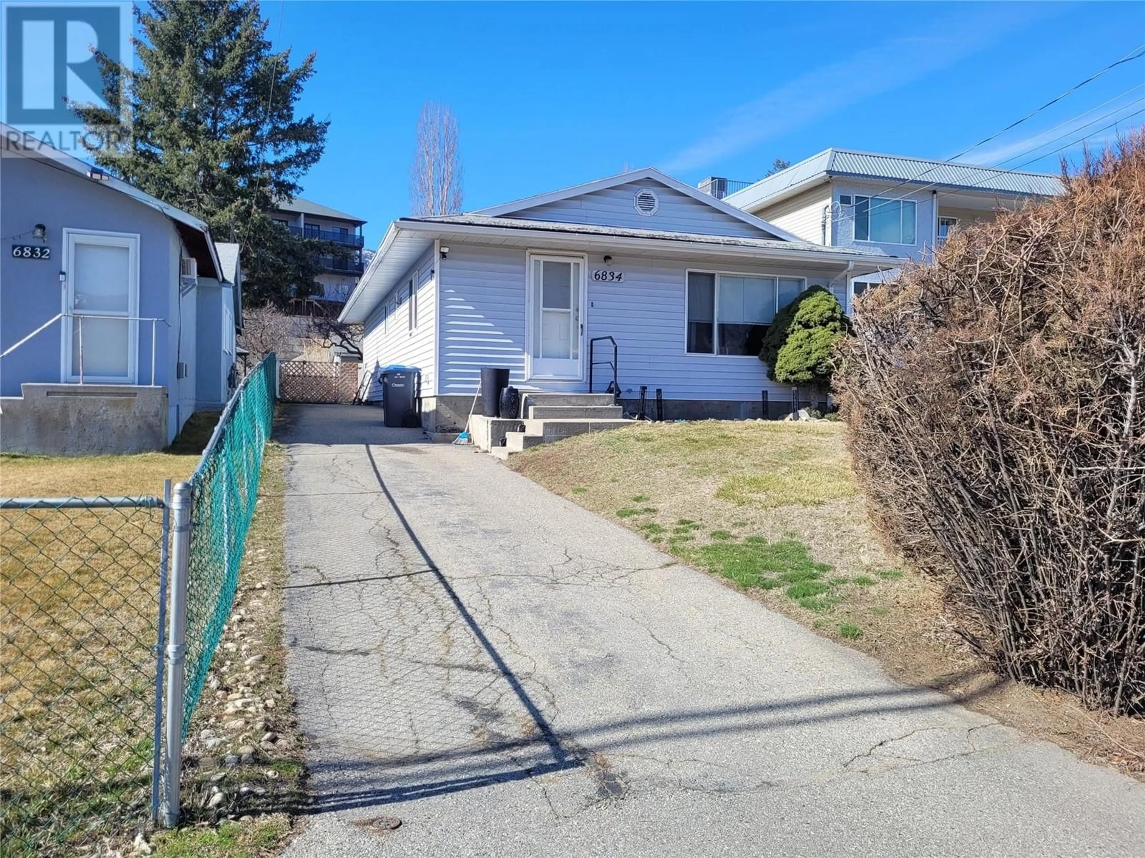 A pic from outside/outdoor area/front of a property/back of a property/a pic from drone, street for 6834 89TH STREET, Osoyoos British Columbia V0H1V1