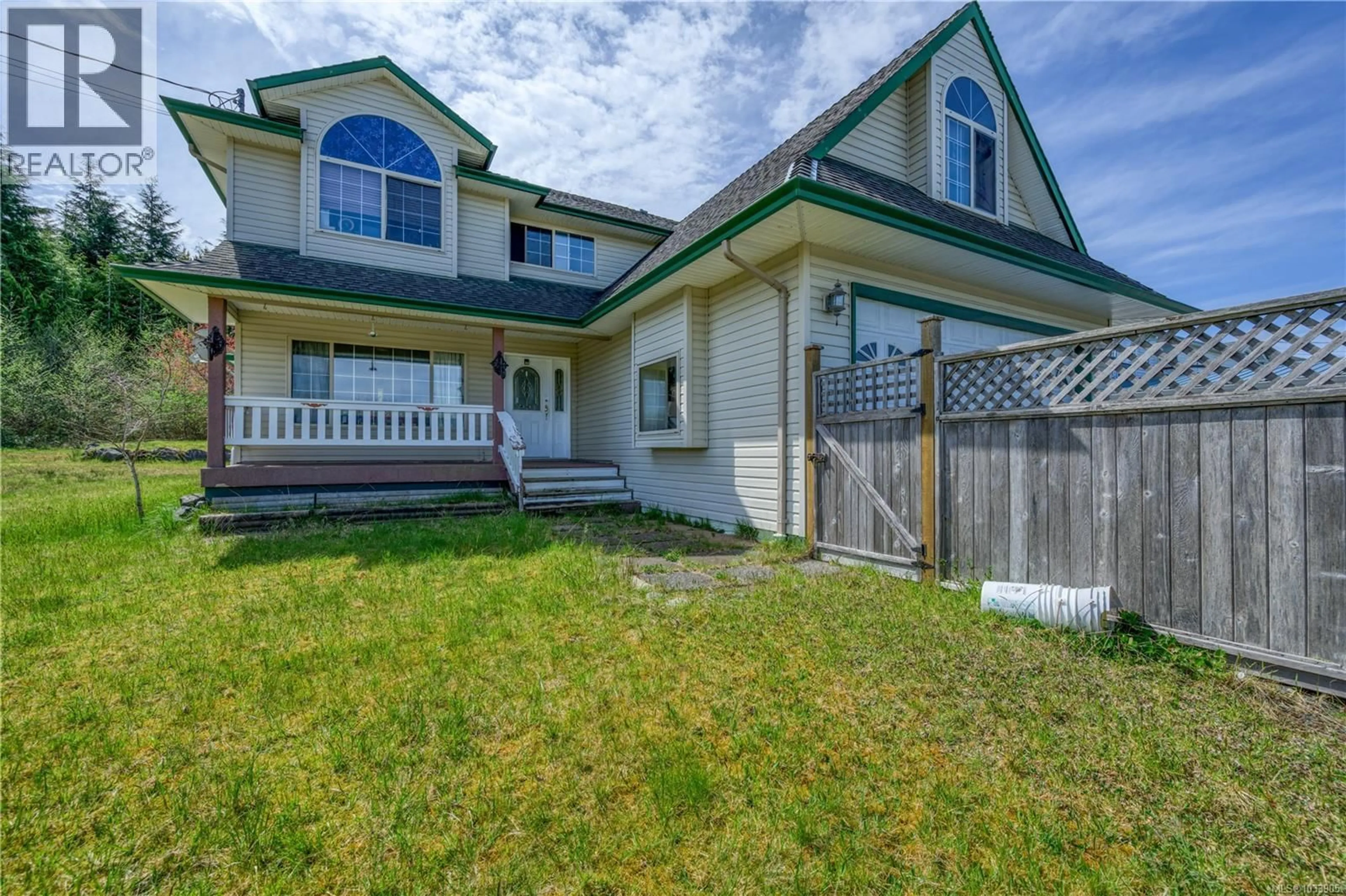 Home with vinyl exterior material, street for 5000 BEAVER HARBOUR ROAD, Port Hardy British Columbia V0N2R0